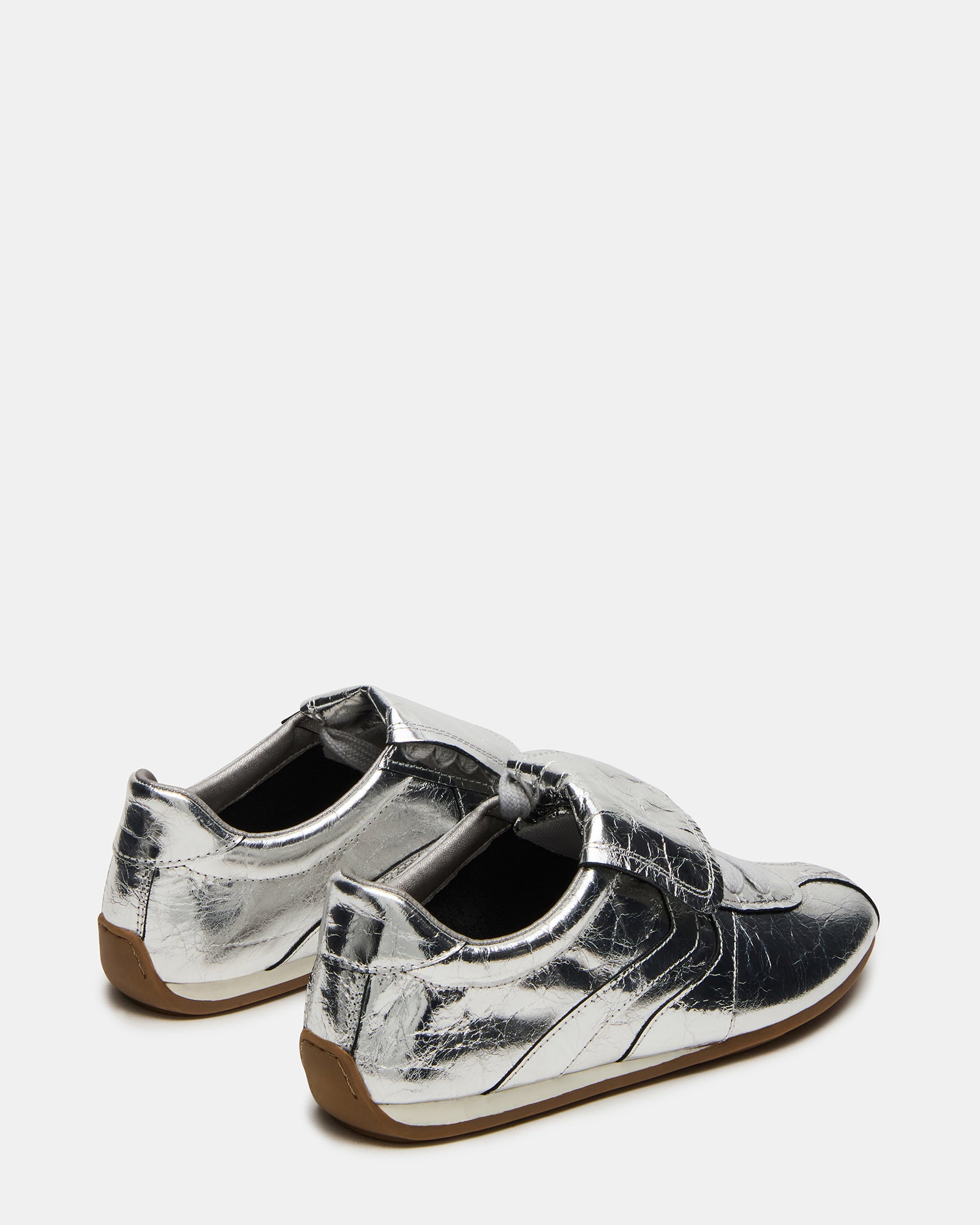 Top view of the sneakers showing the lace-up closure and stylish silhouette