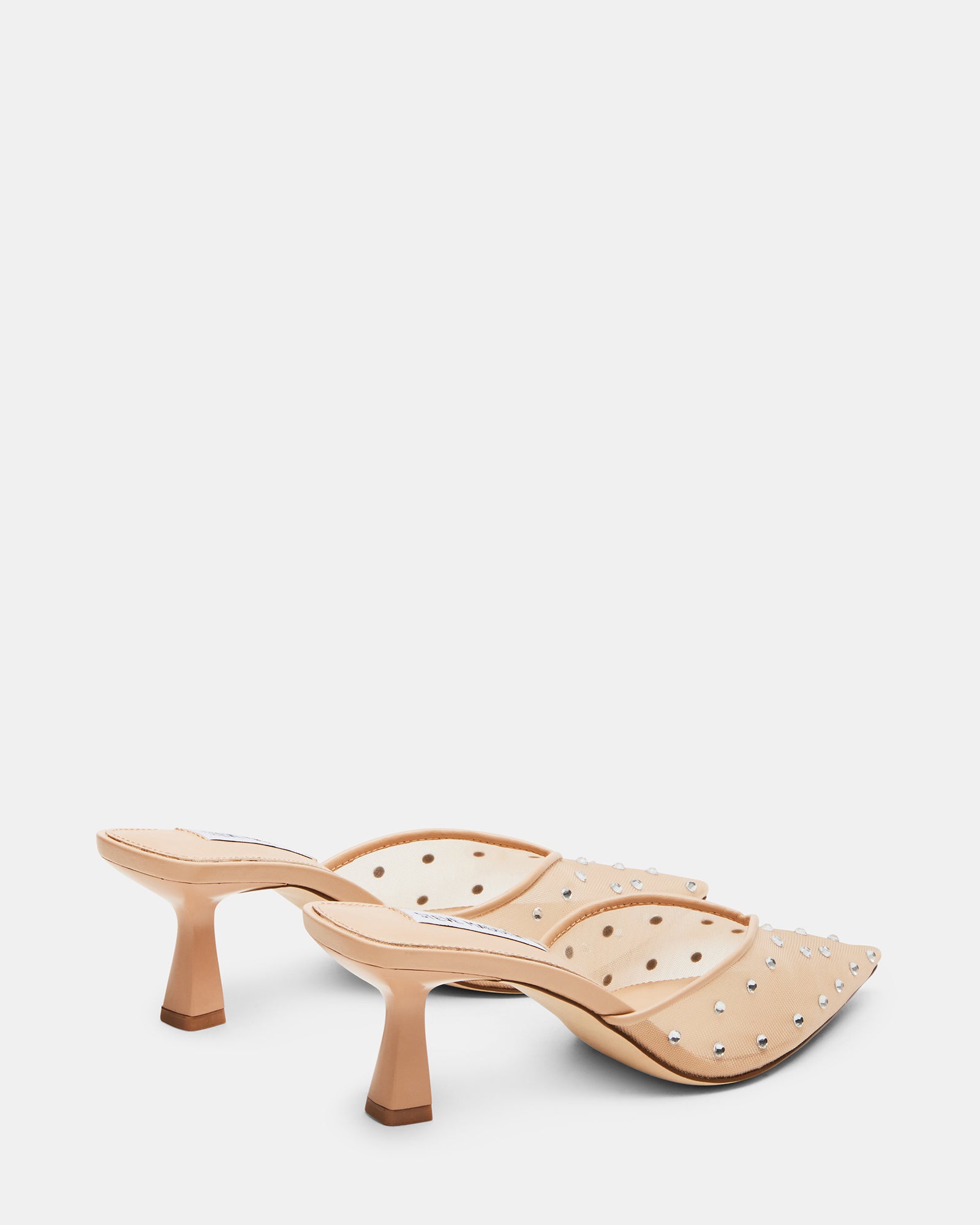 Side view of kitten heel boots-style silhouette with blush tone and sparkle