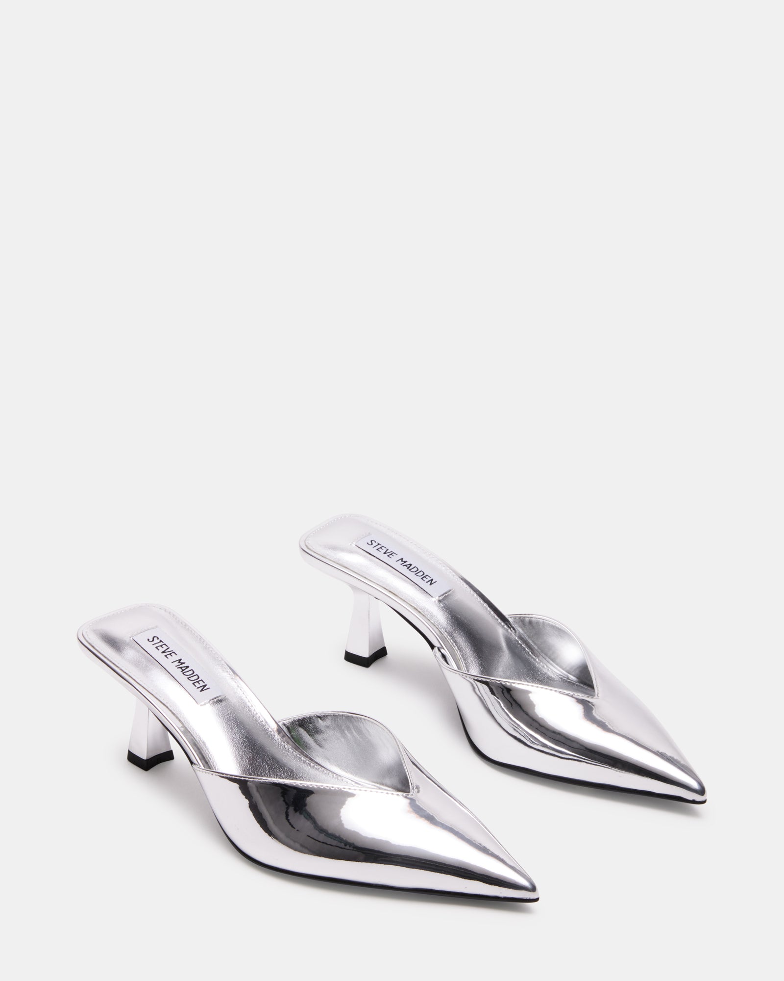 Close-up of the pointed toe and metallic finish on MOD mule heels