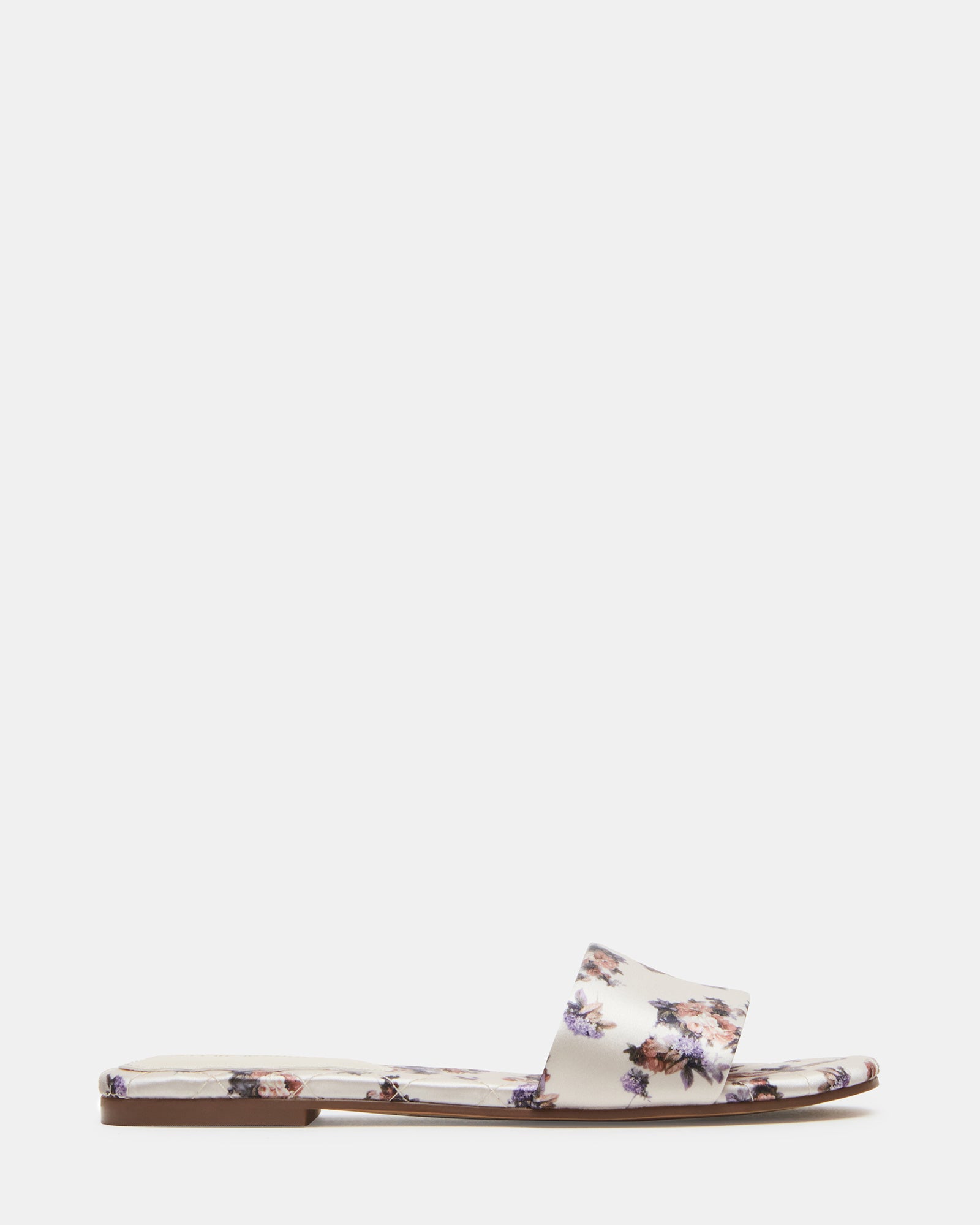Stylish quilted slide sandals for women, showcasing the elegant design.