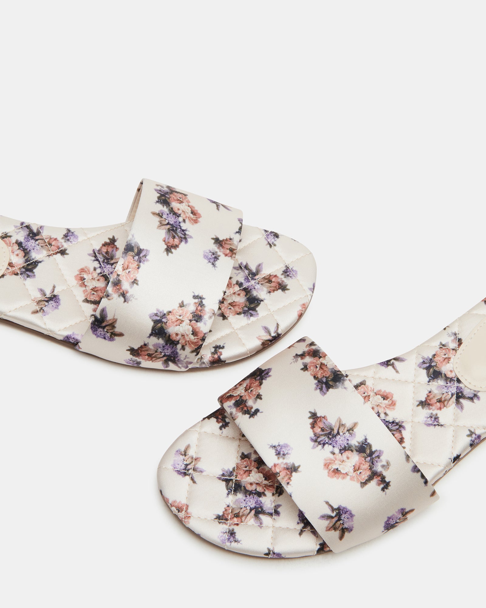Close-up of the chic slide sandals with synthetic lining for added comfort.