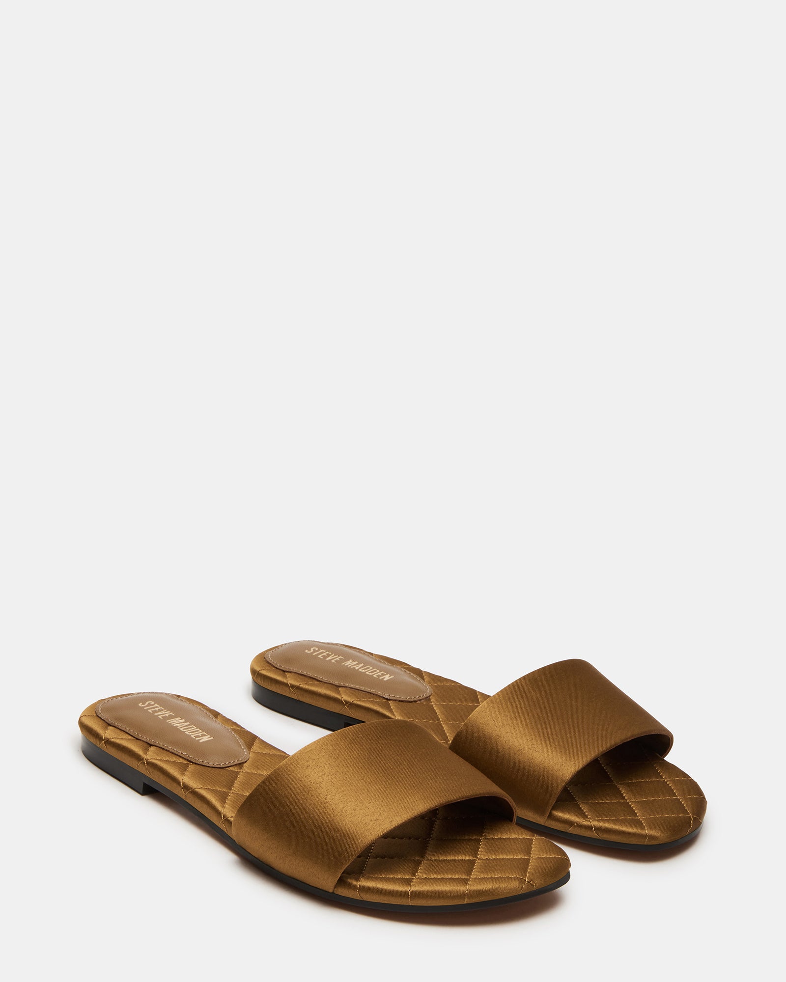 Quilted detail of comfortable slide sandals from side angle