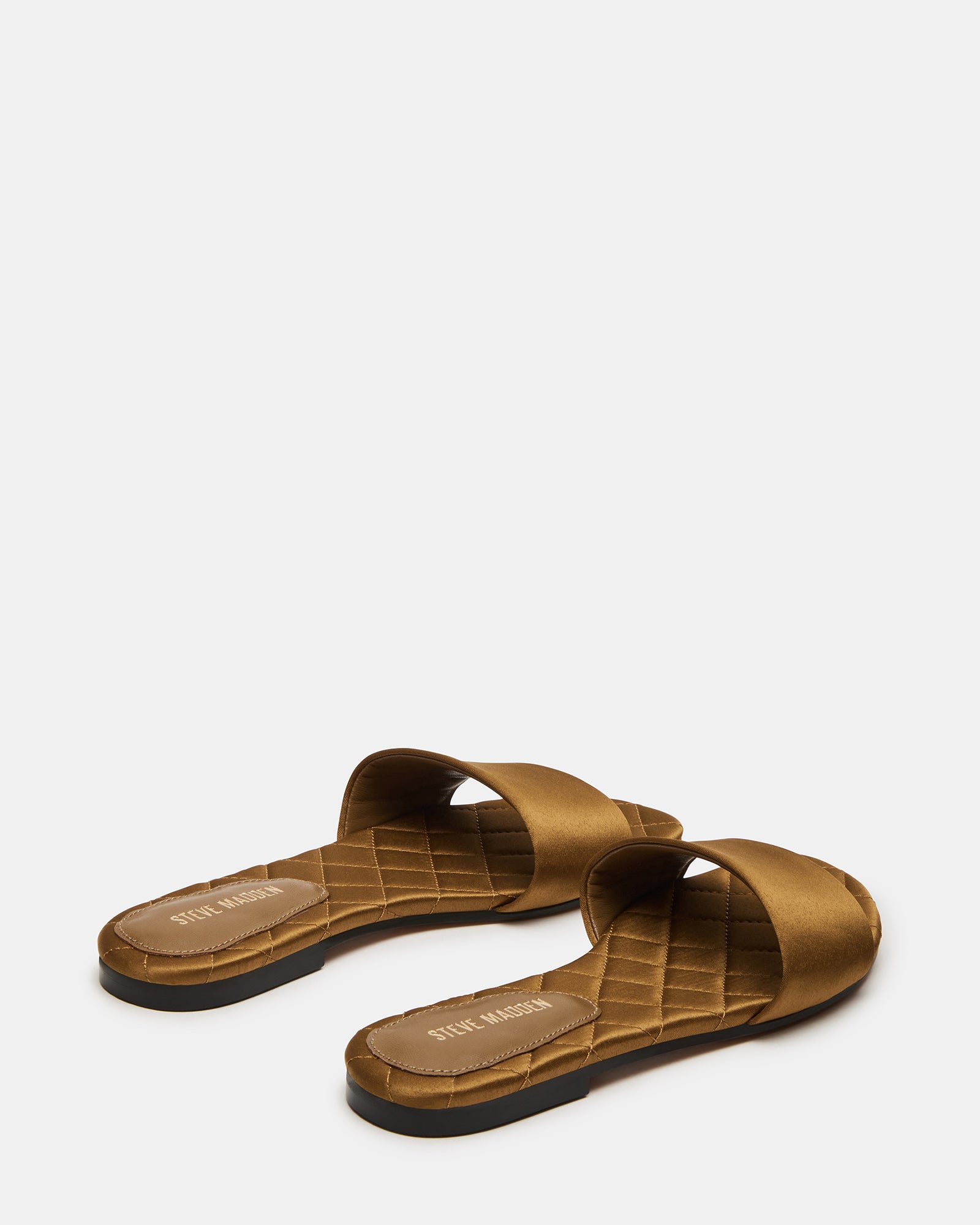 Quilted detail of comfortable slide sandals from side angle