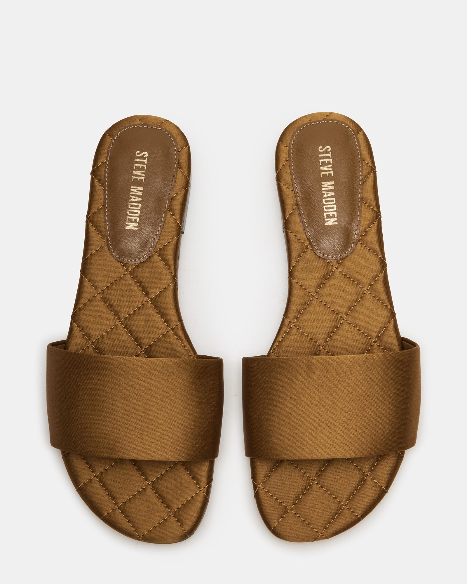 Mojito Olive slide comfort sandals worn on a sunny boardwalk