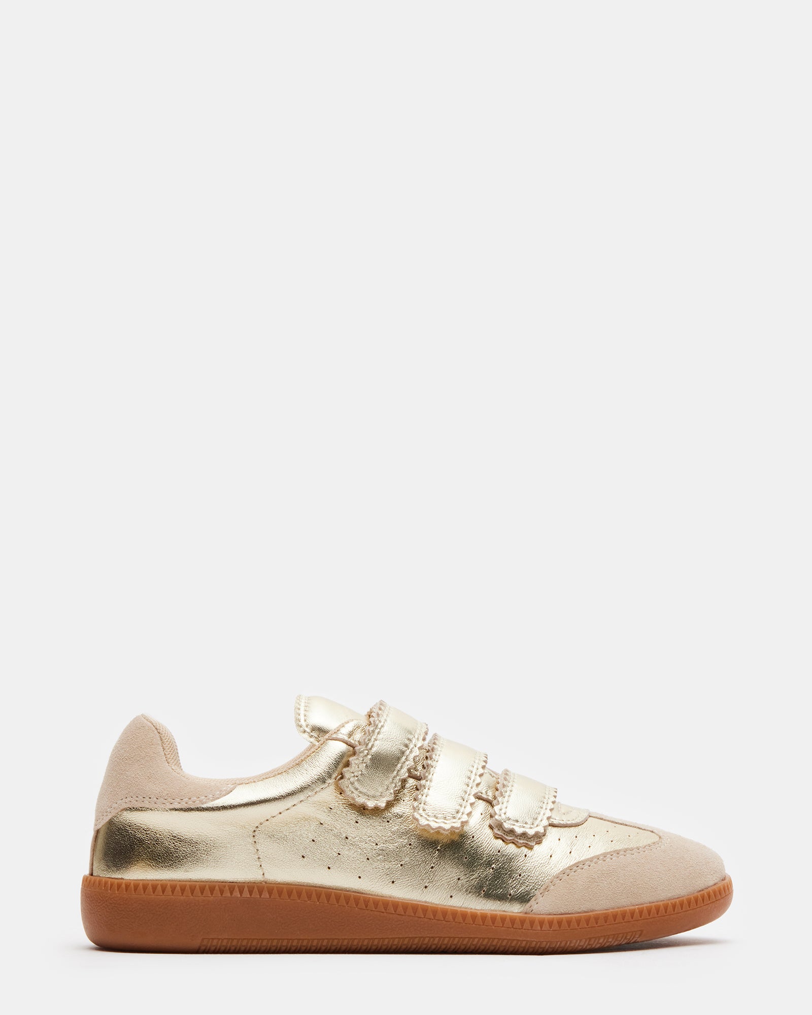 Side view of bottega-inspired velcro sneakers with gold detail on hardwood floor