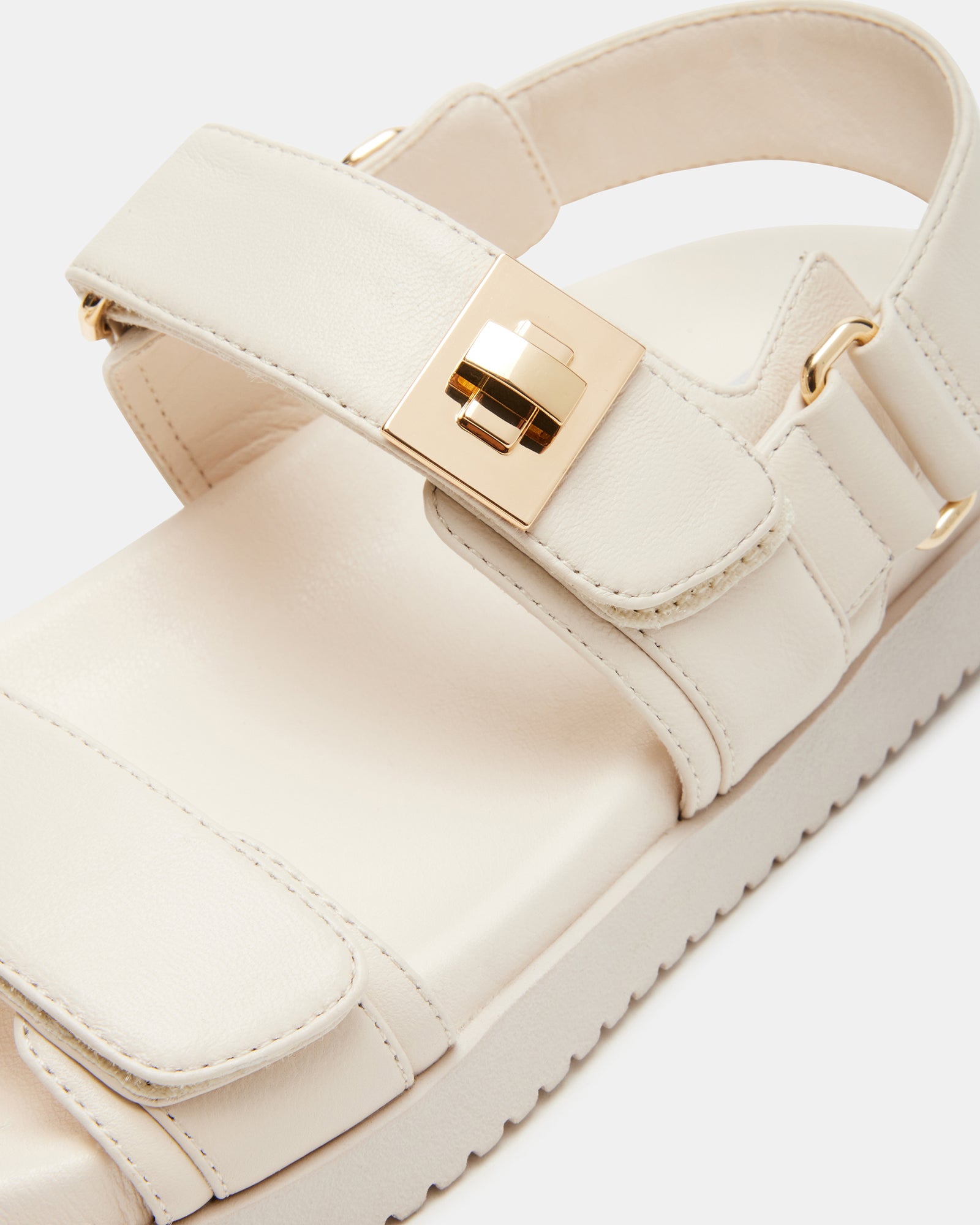 Top-down view of the MONA LuxeStrap leather sandals showing molded footbed and strap detail