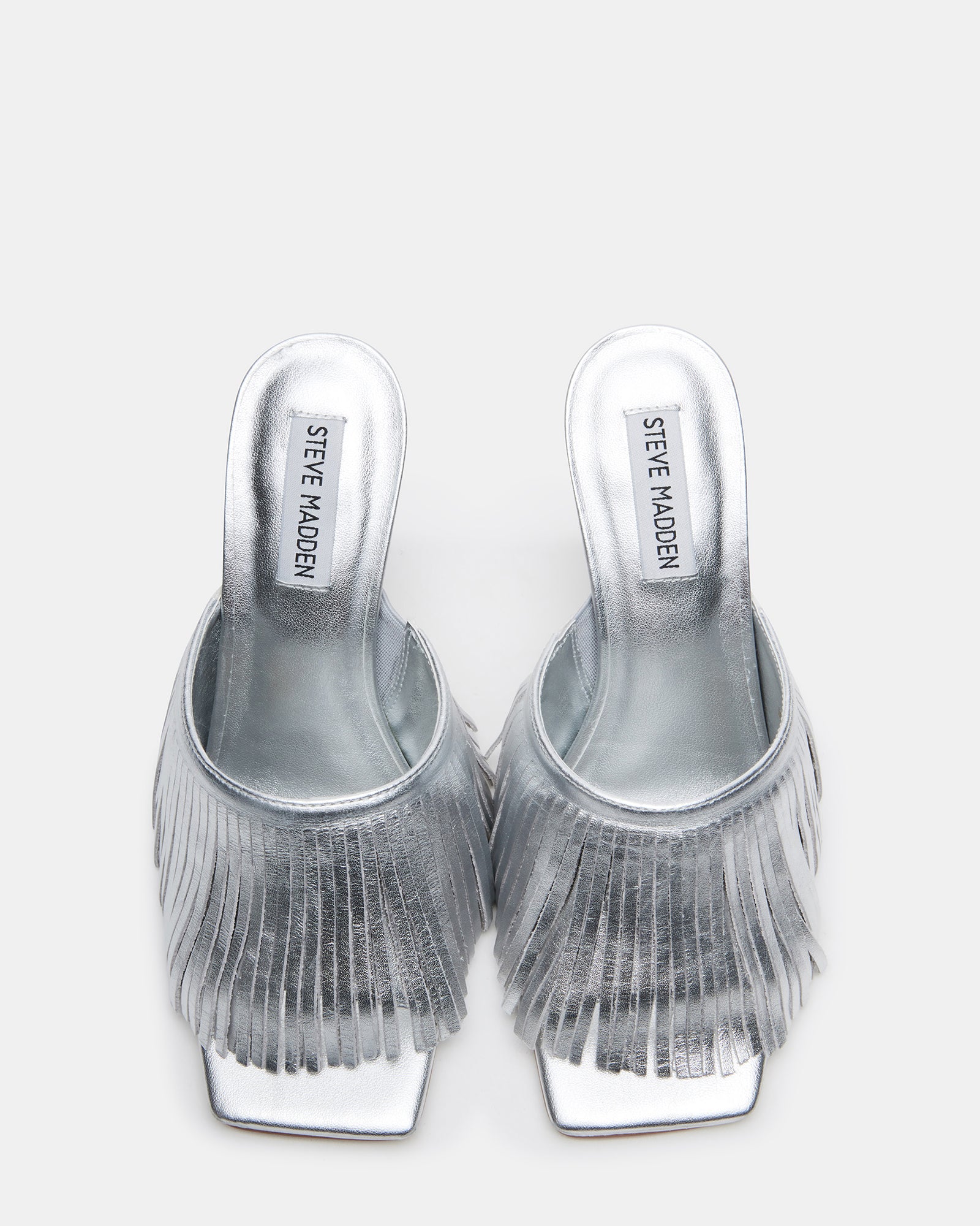 Side view of silver leather high heels with fringe detail, suitable for formal events