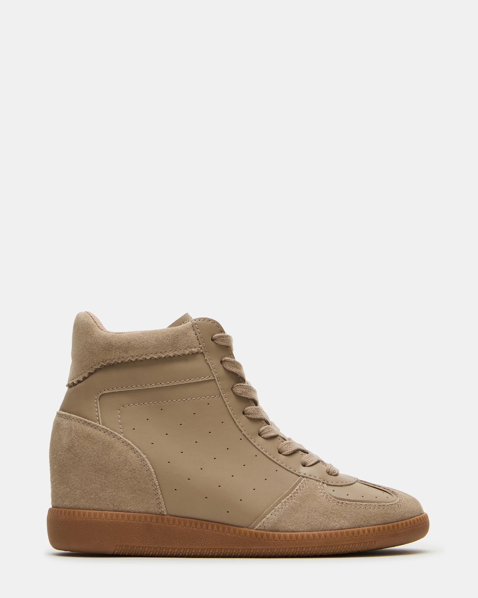 Side angle of taupe lace-up high-top sneakers with hidden wedge on city pavement