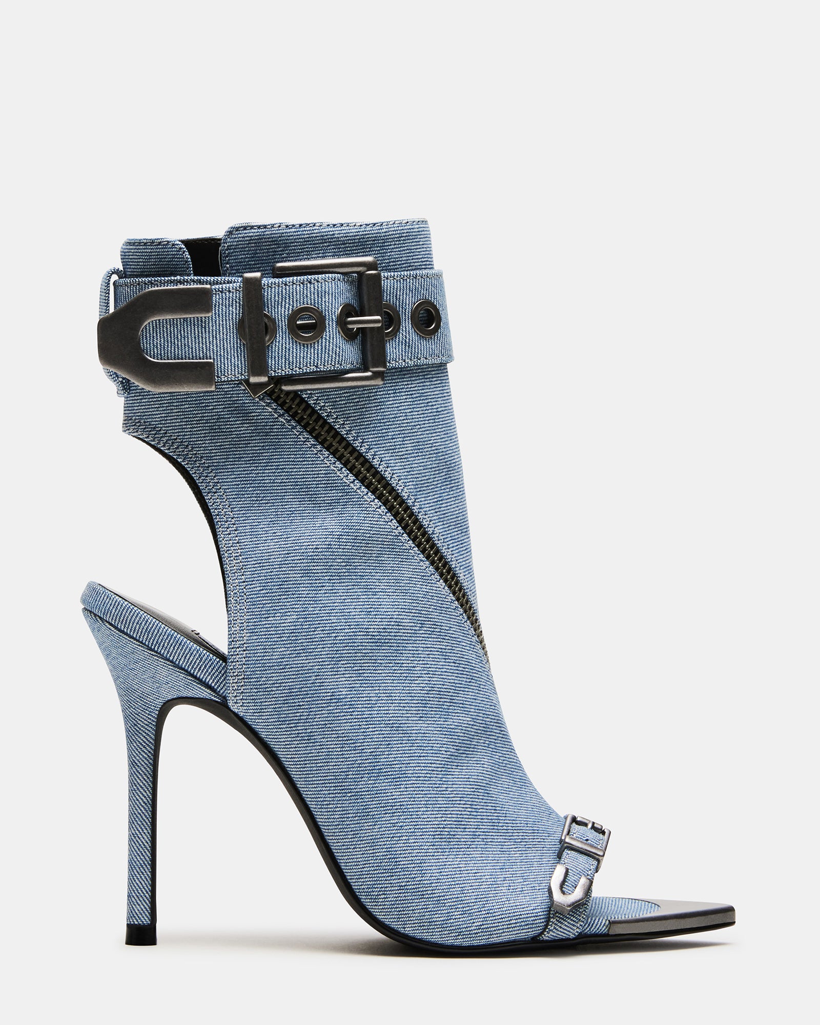 Elegant peep toe ankle booties showcasing stiletto heels in a stylish setting.