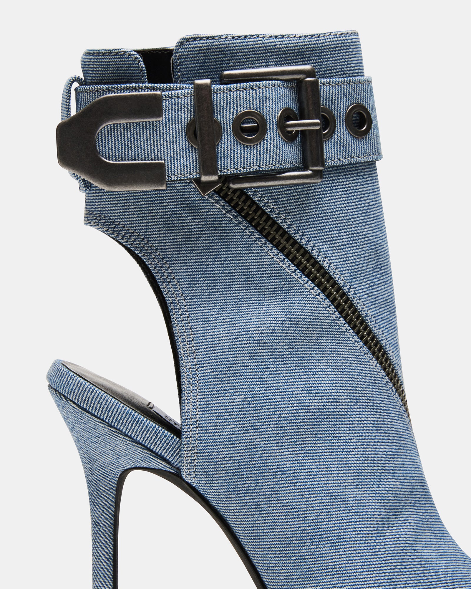 Side view of peep toe ankle booties, highlighting their sleek design.