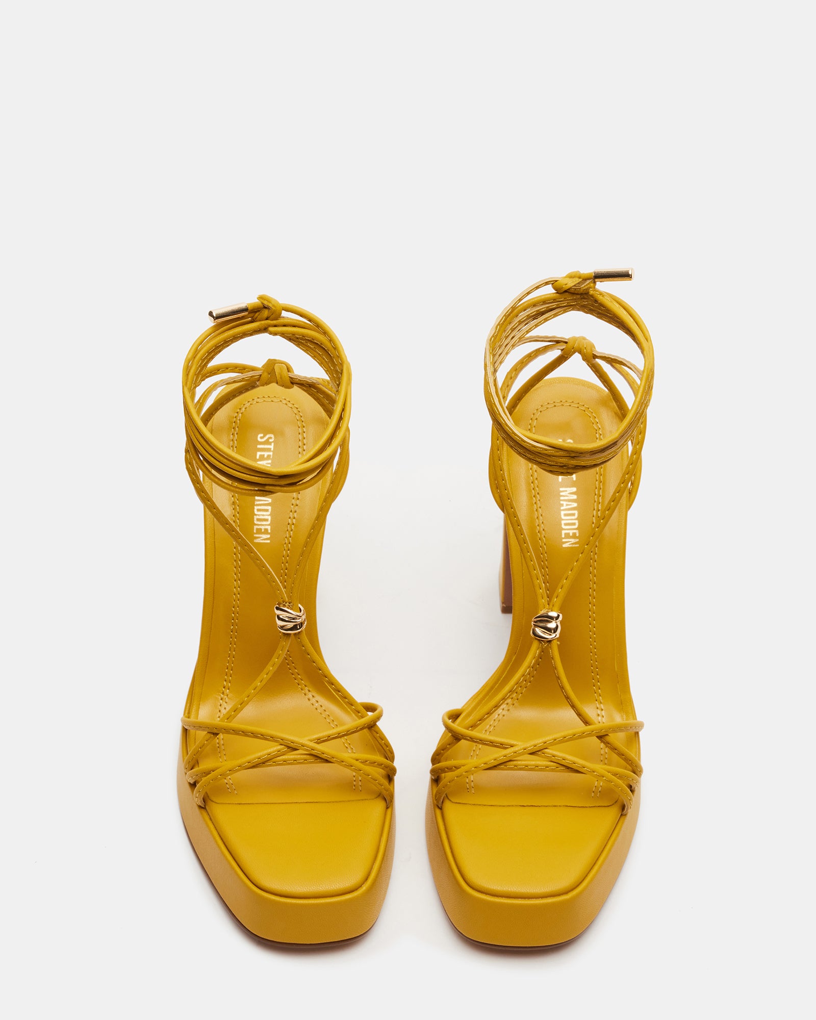 Side view of Moulin Mustard platform heels with lace-up straps and open toe