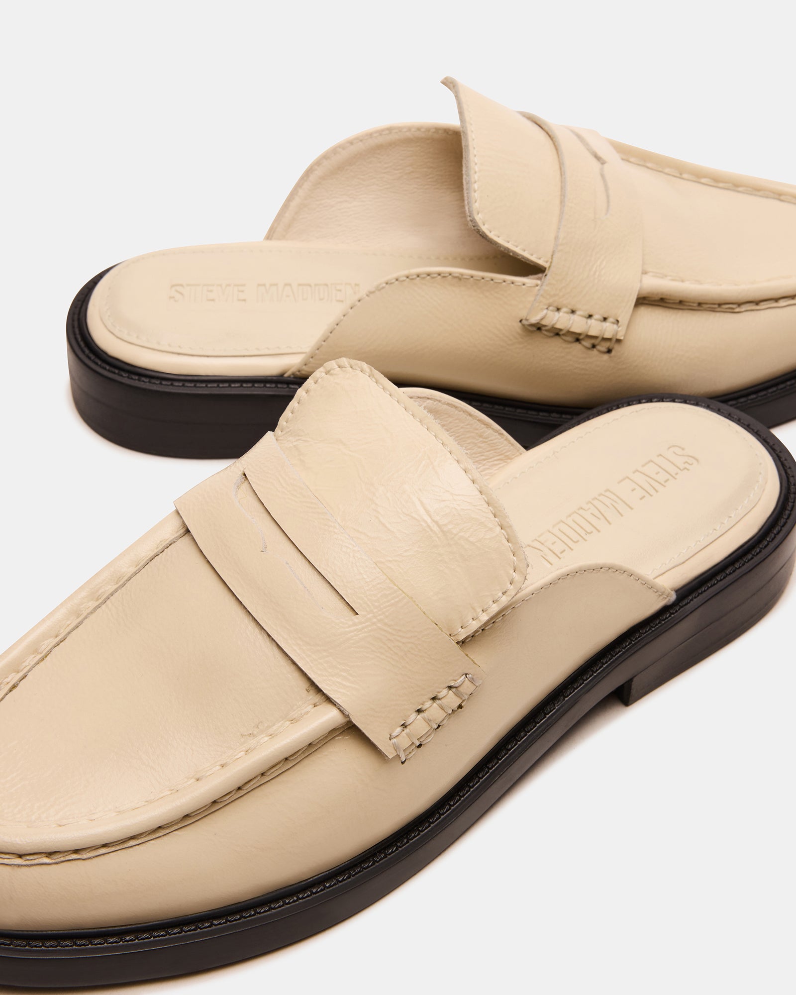 Close-up of the textured leather and stitching on these luxury flats.