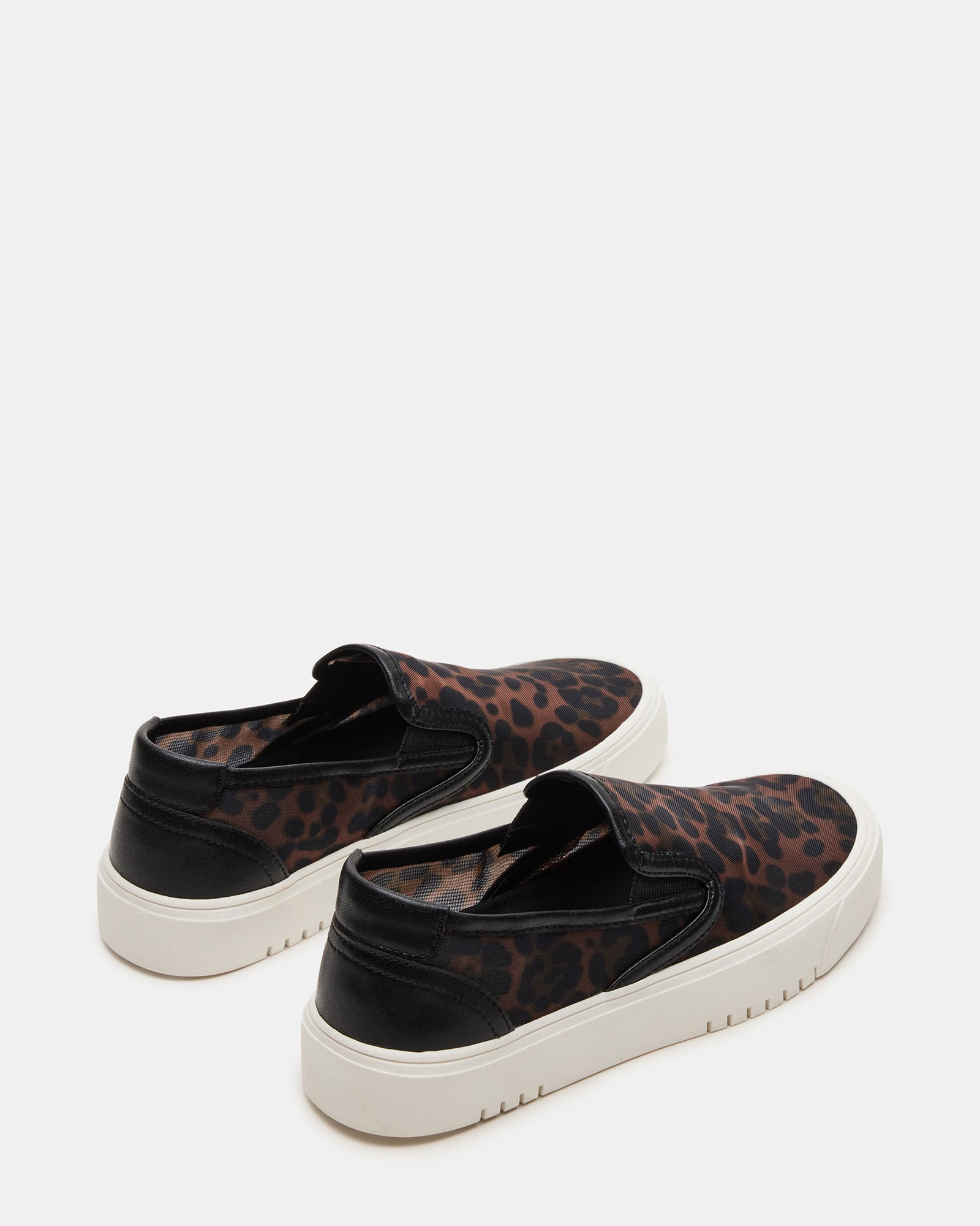 Close-up of mens casual shoes with a stylish leopard print pattern