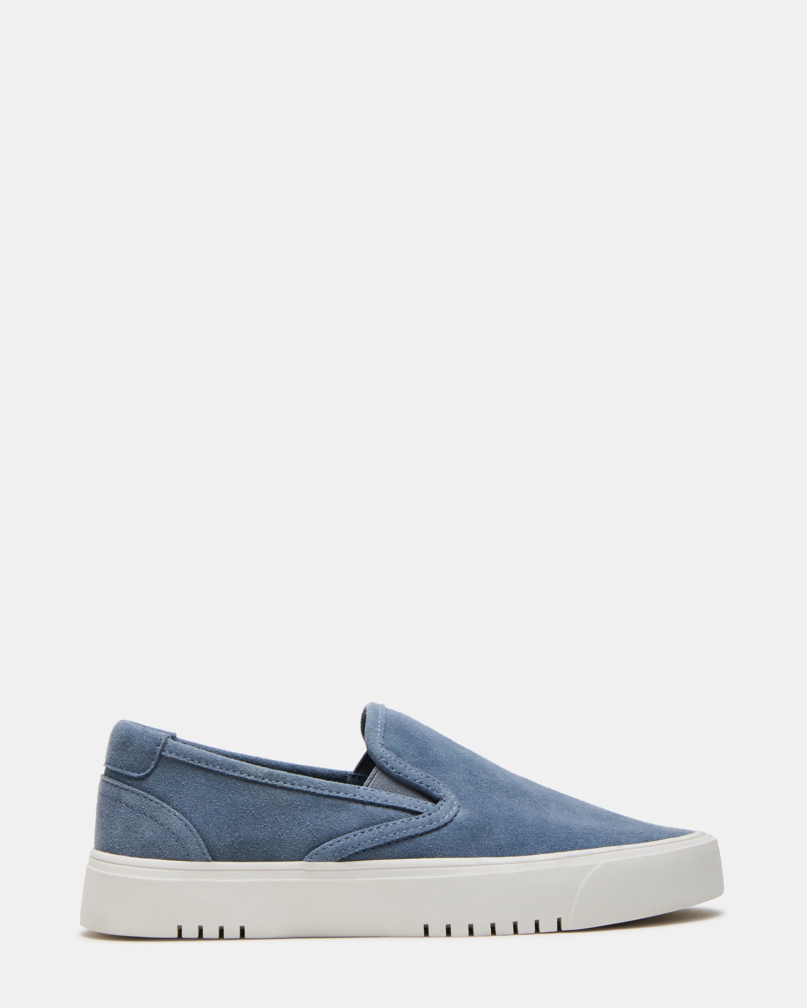 Close-up of men's suede shoes with white sneakers laces and sleek design