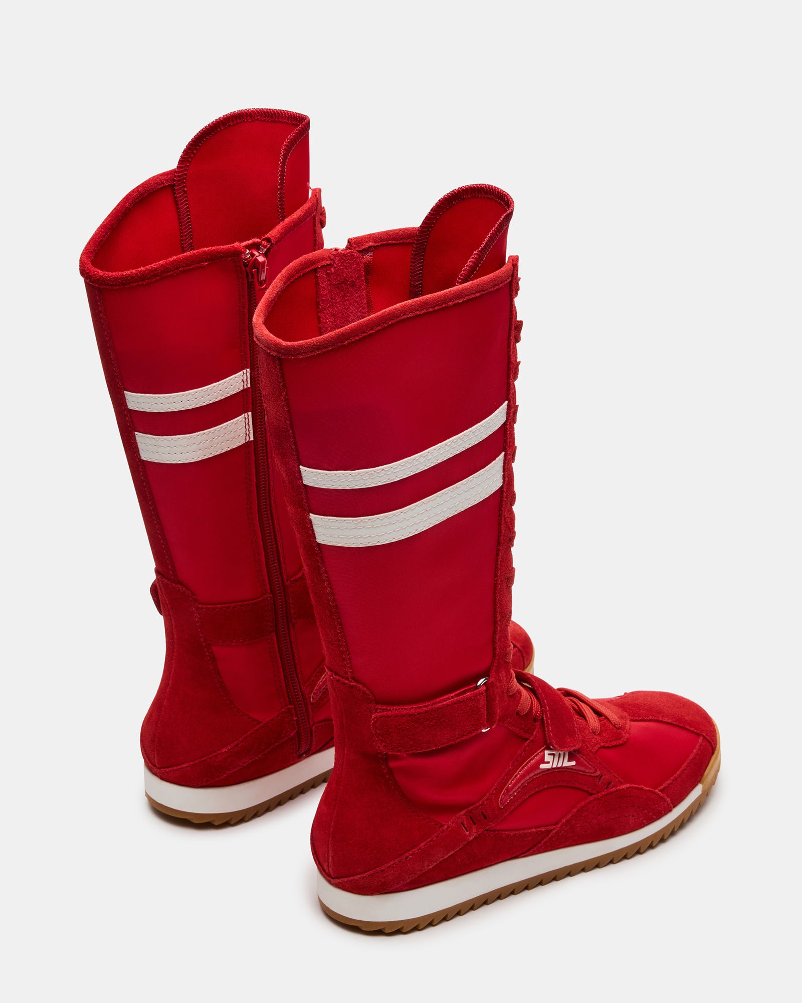 Side view showcasing the shaft height and layered textures of these high-top sneakers.