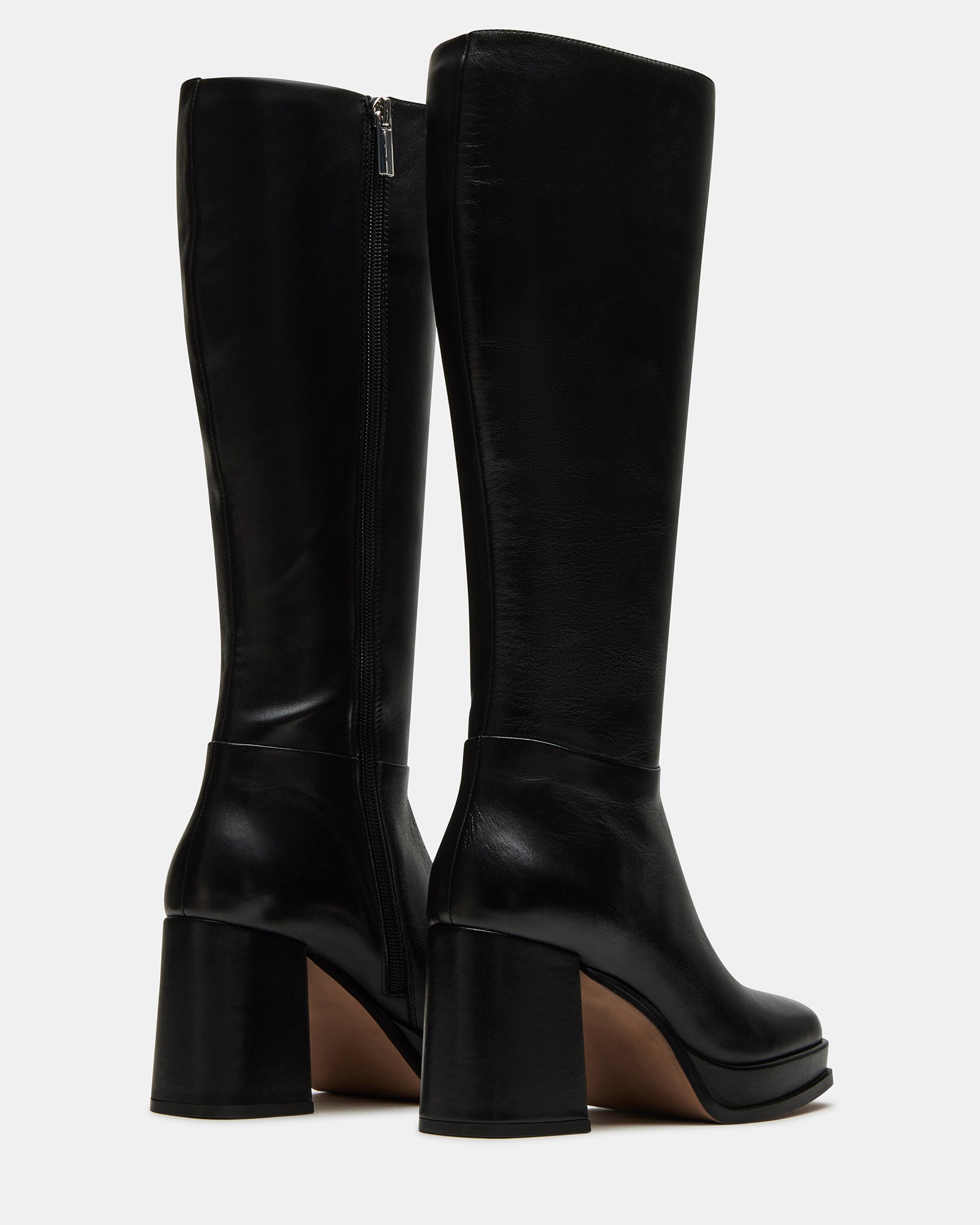 Close-up of the square toe design on the black platform boots