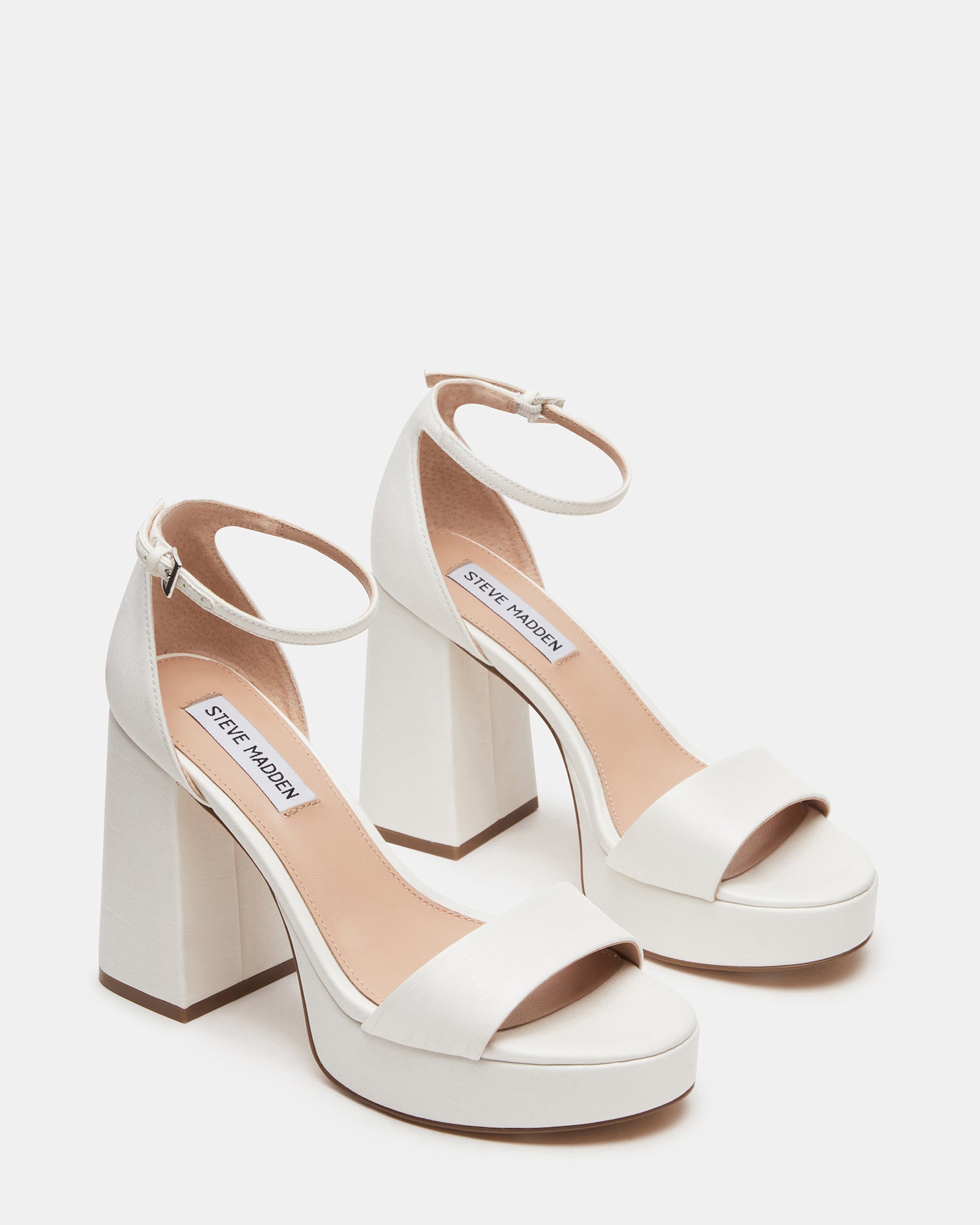 Close-up of ankle strap detail on elegant black block heels