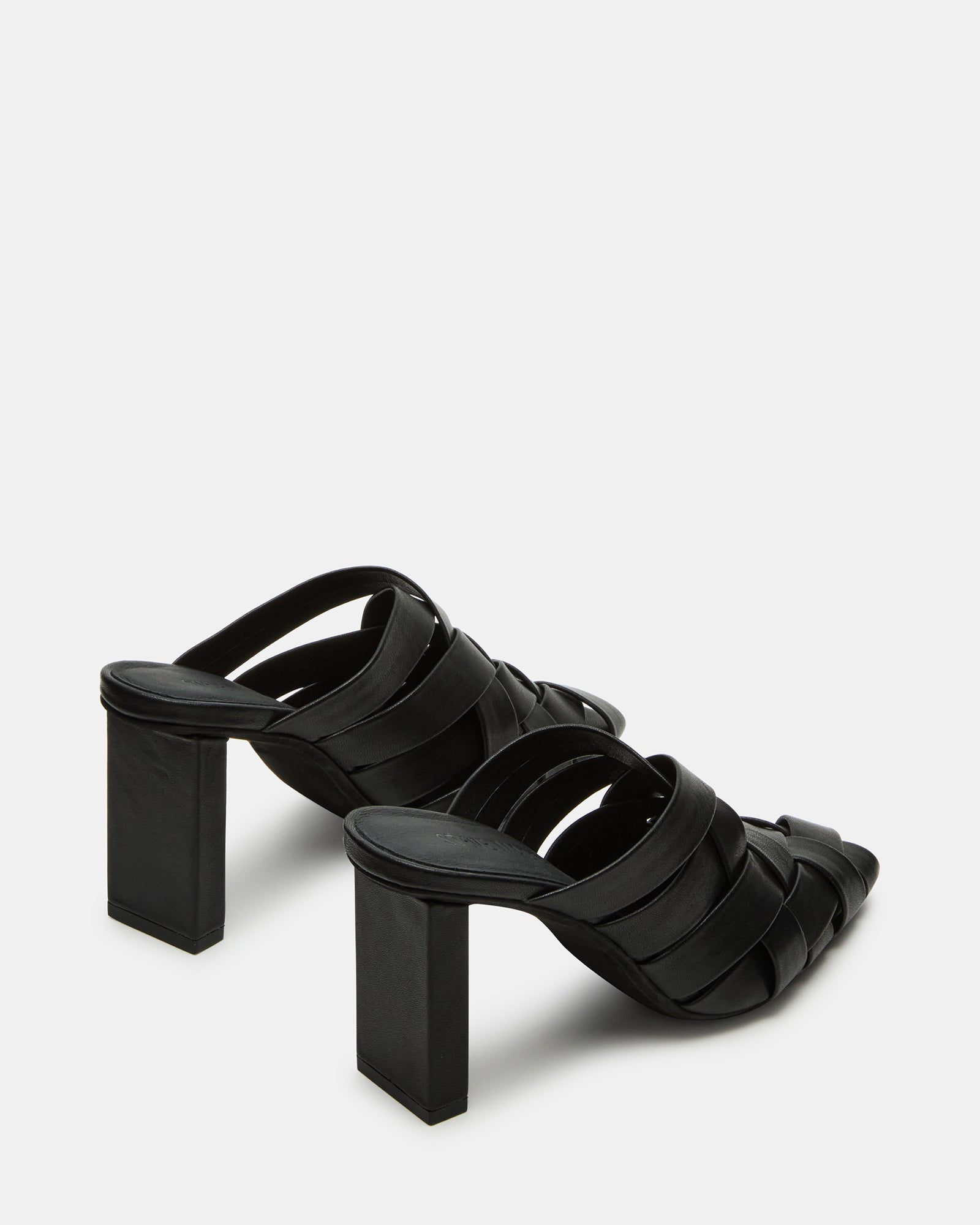 NAKITA kitten heel mules styled with cropped jeans for a casual day out