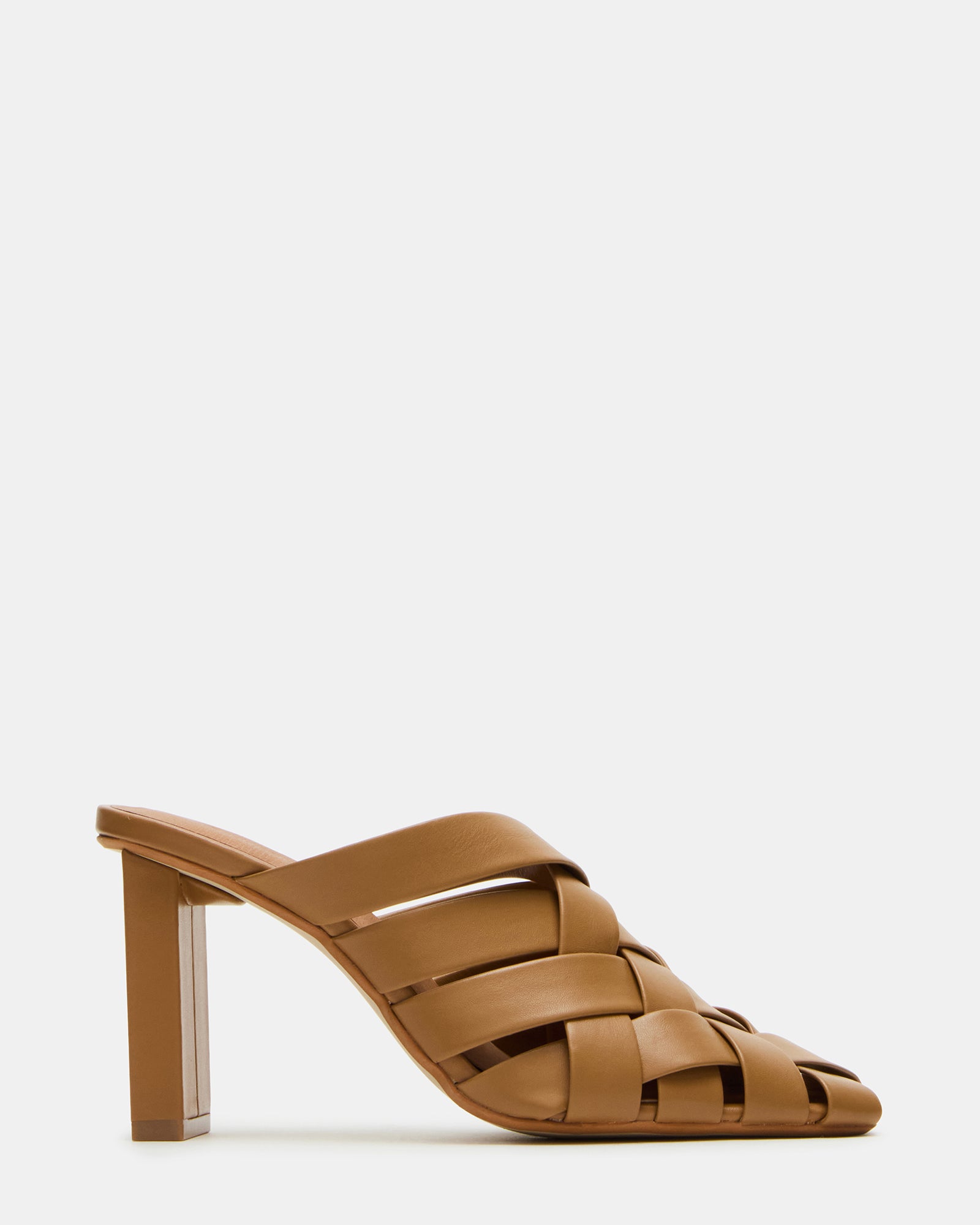 Top view of white mule heels showing woven texture and square toe design