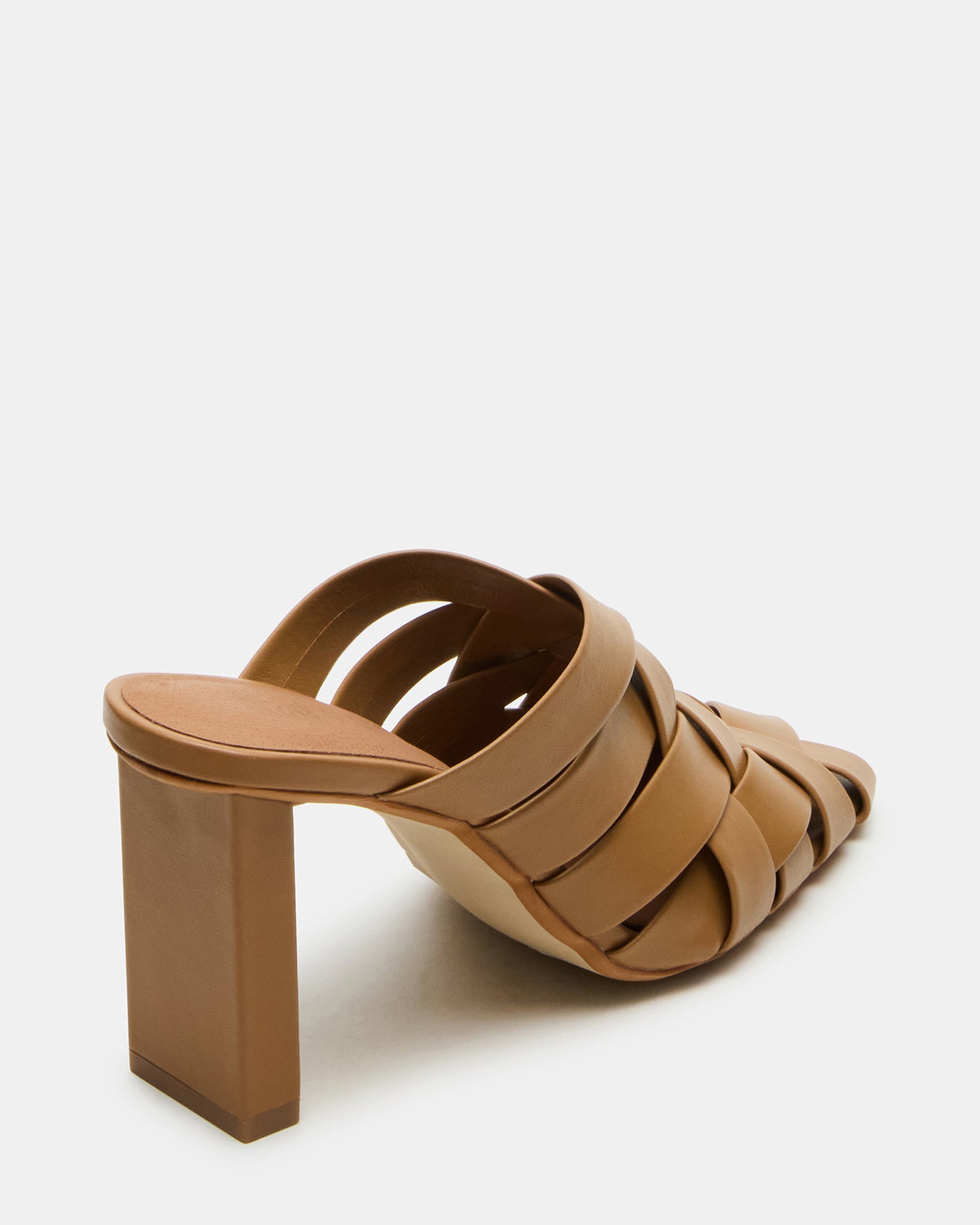 Side angle of kitten heel mules shoes styled with casual denim for daily use
