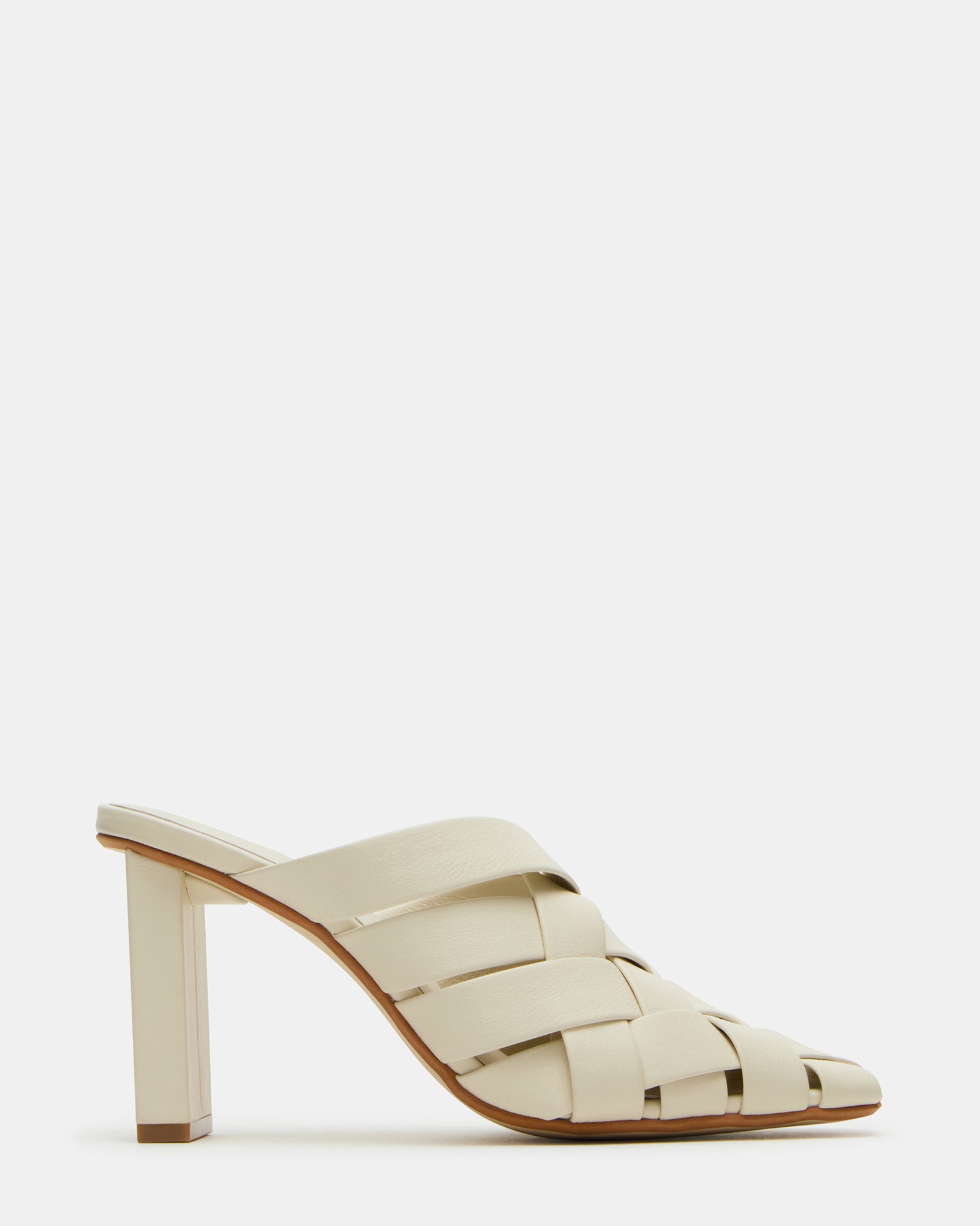 Front angle of NAKITA white mules showing square toe and woven texture