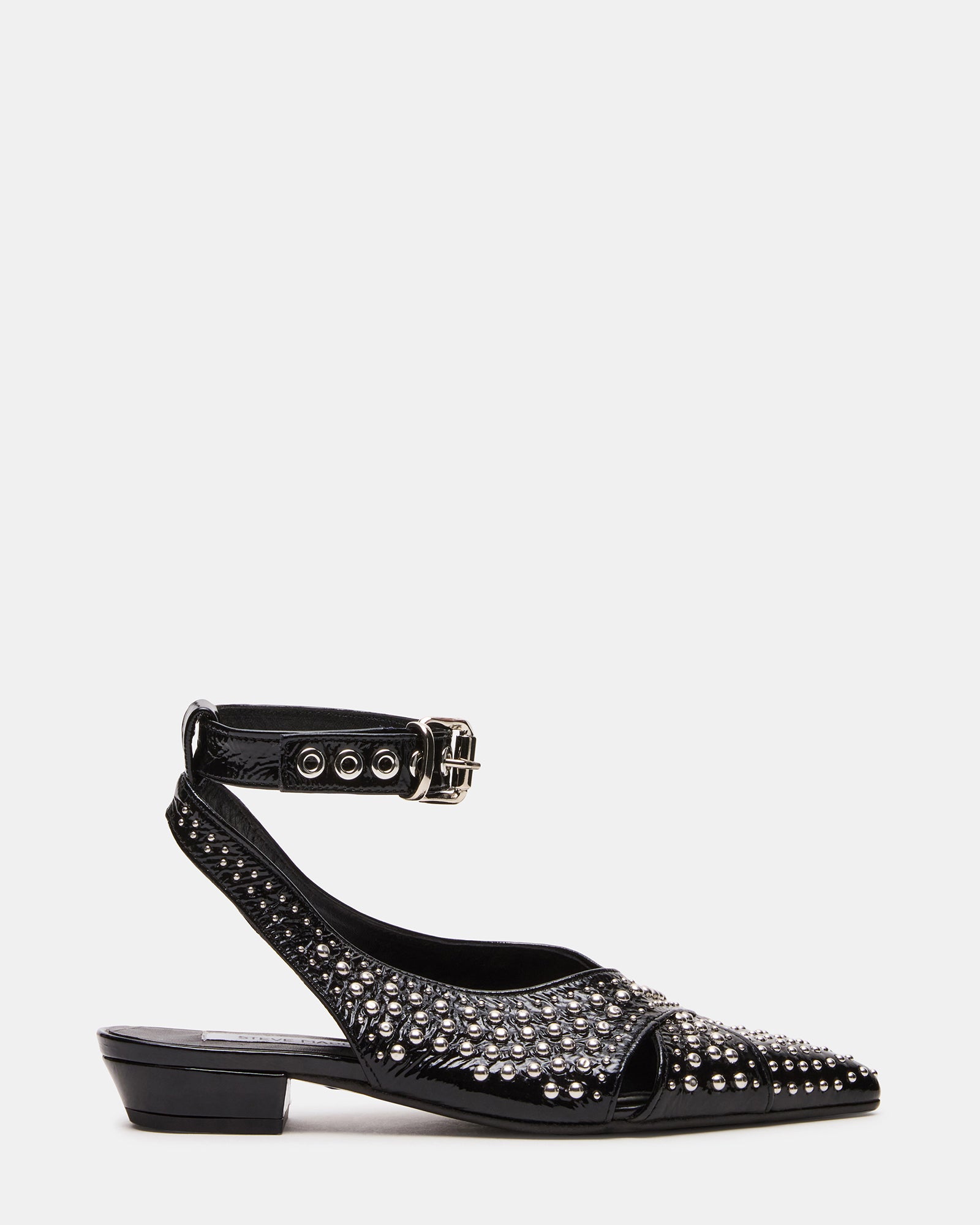 Side angle of black leather slingback flats showing pointed toe and studded strap