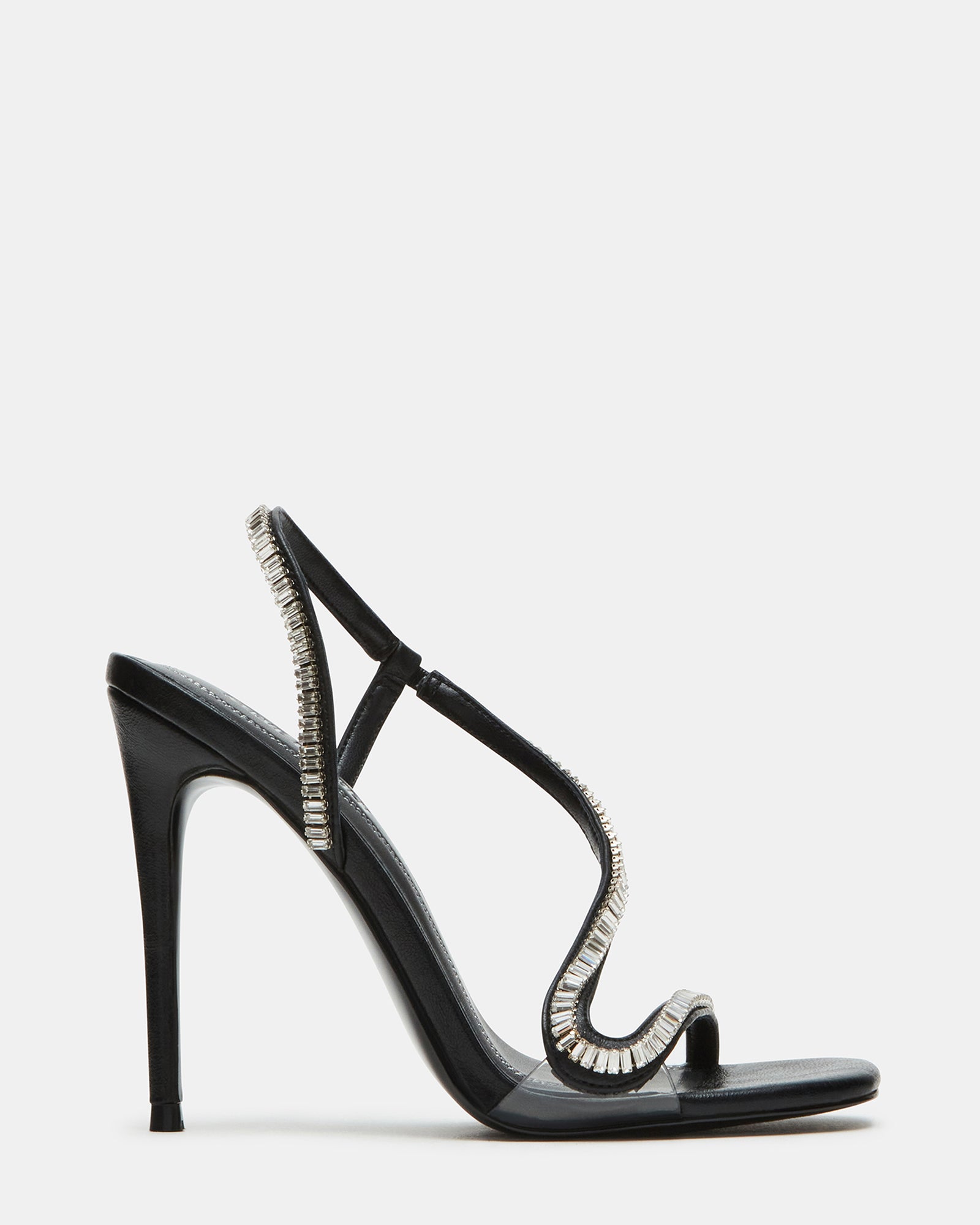 Side view of nude strappy heels showcasing rhinestone details.