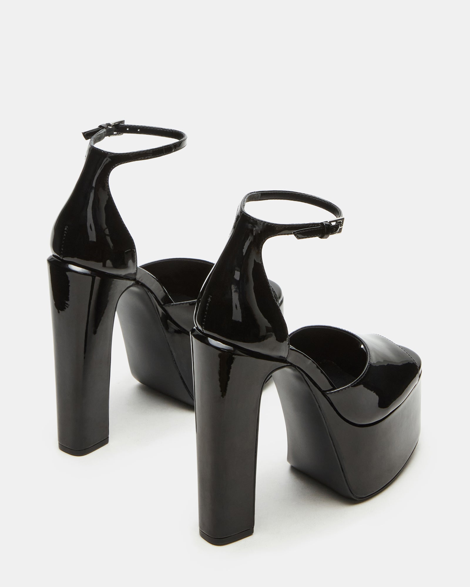 Front view of stylish black patent block heels with square toe design