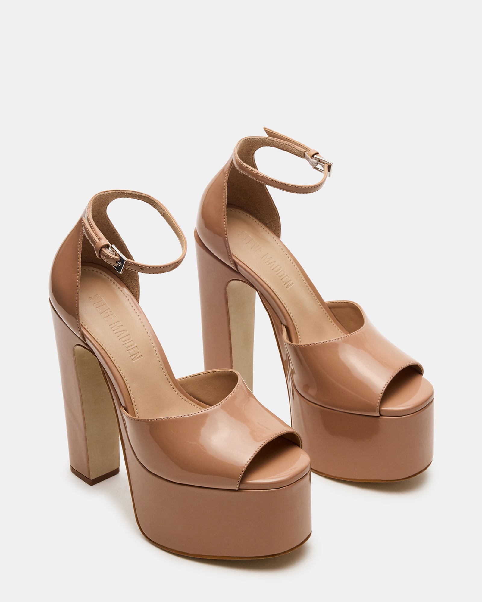 Close-up of square toe and ankle strap highlighting gold heels detail