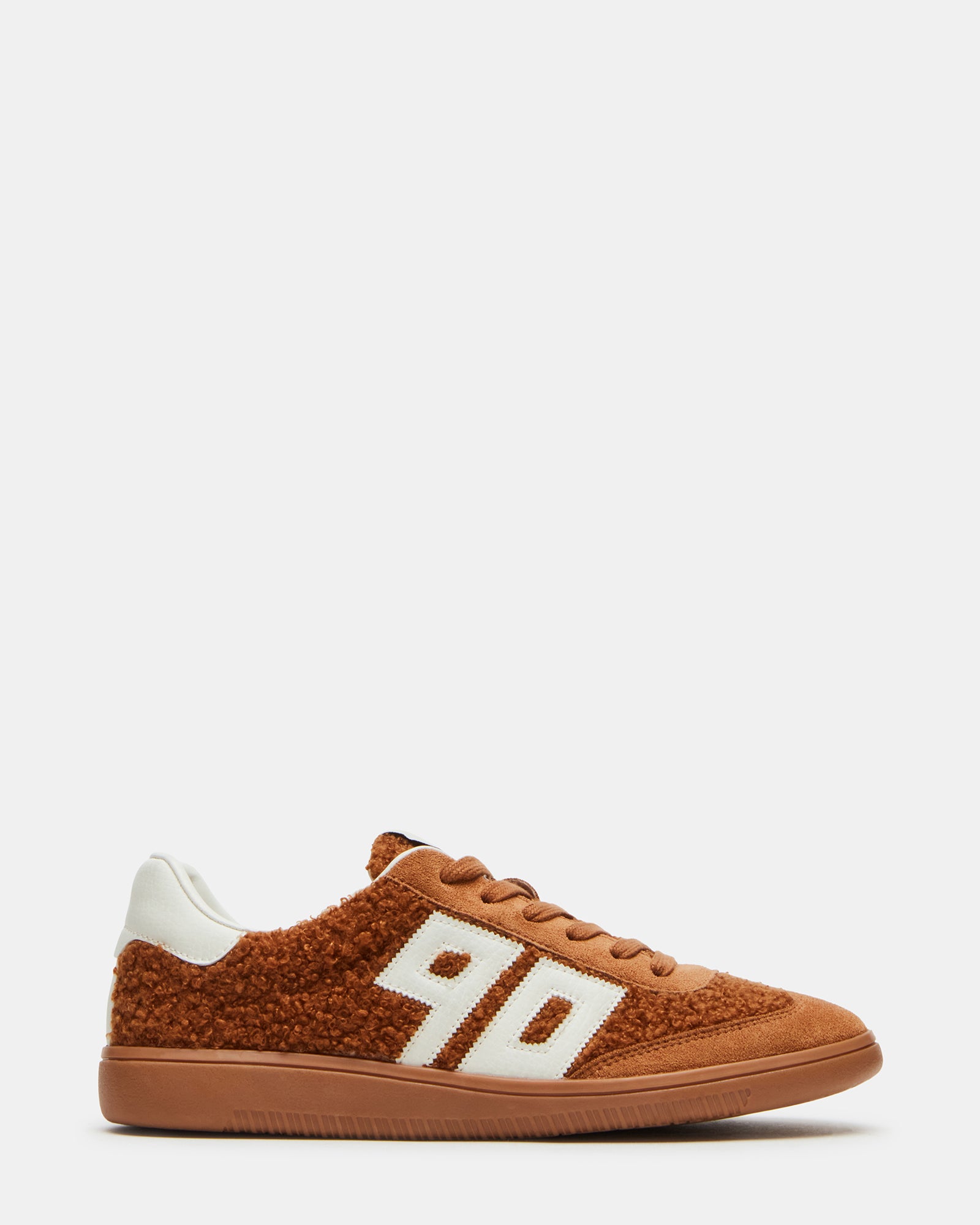NINETIES Tobacco sneakers styled with casual jeans for everyday wear