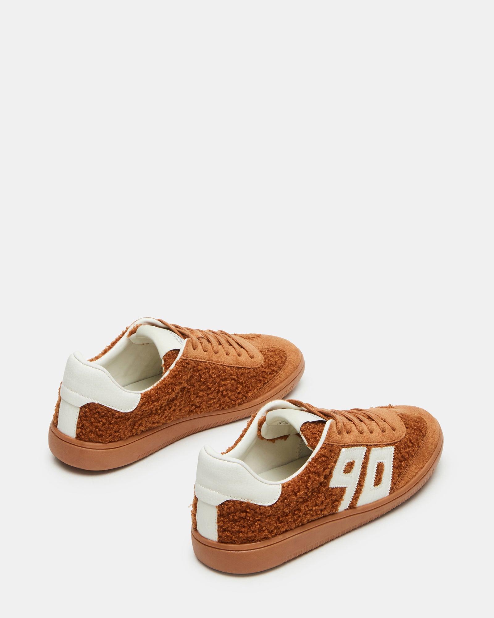 Close-up of faux shearling lining and microsuede upper material