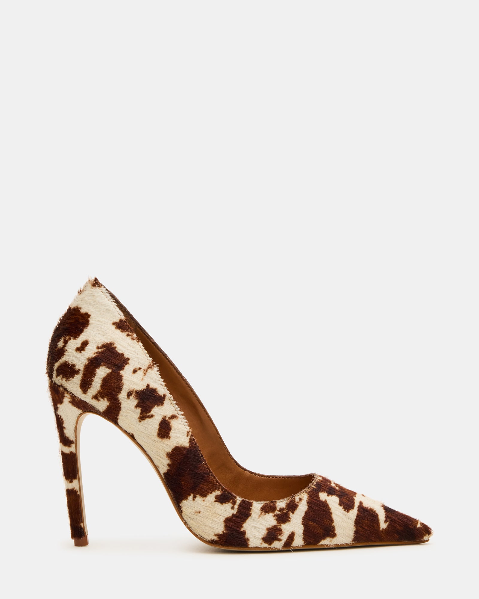 Side view of cow print pumps highlighting the 4-inch stiletto heel