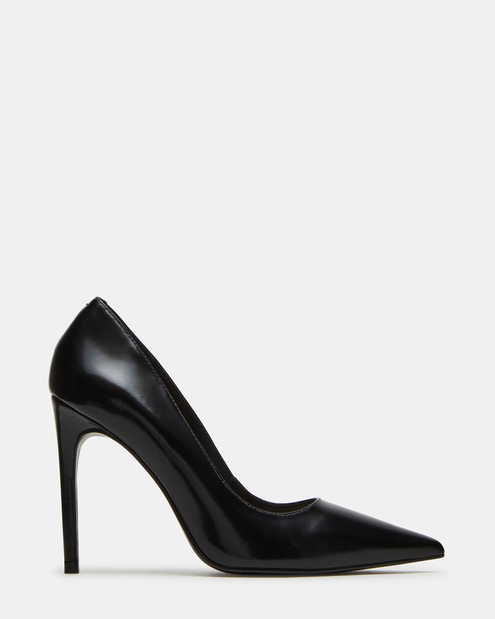 Black leather pointed toe pumps with stiletto heels on a model's feet
