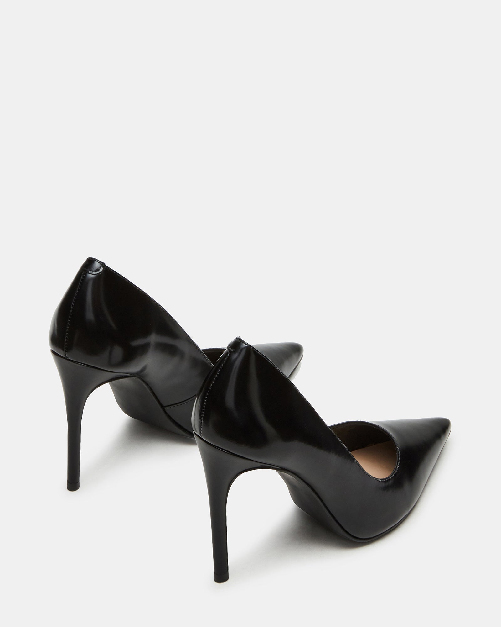 Close-up of the sleek stiletto heels and pointed toe shoes