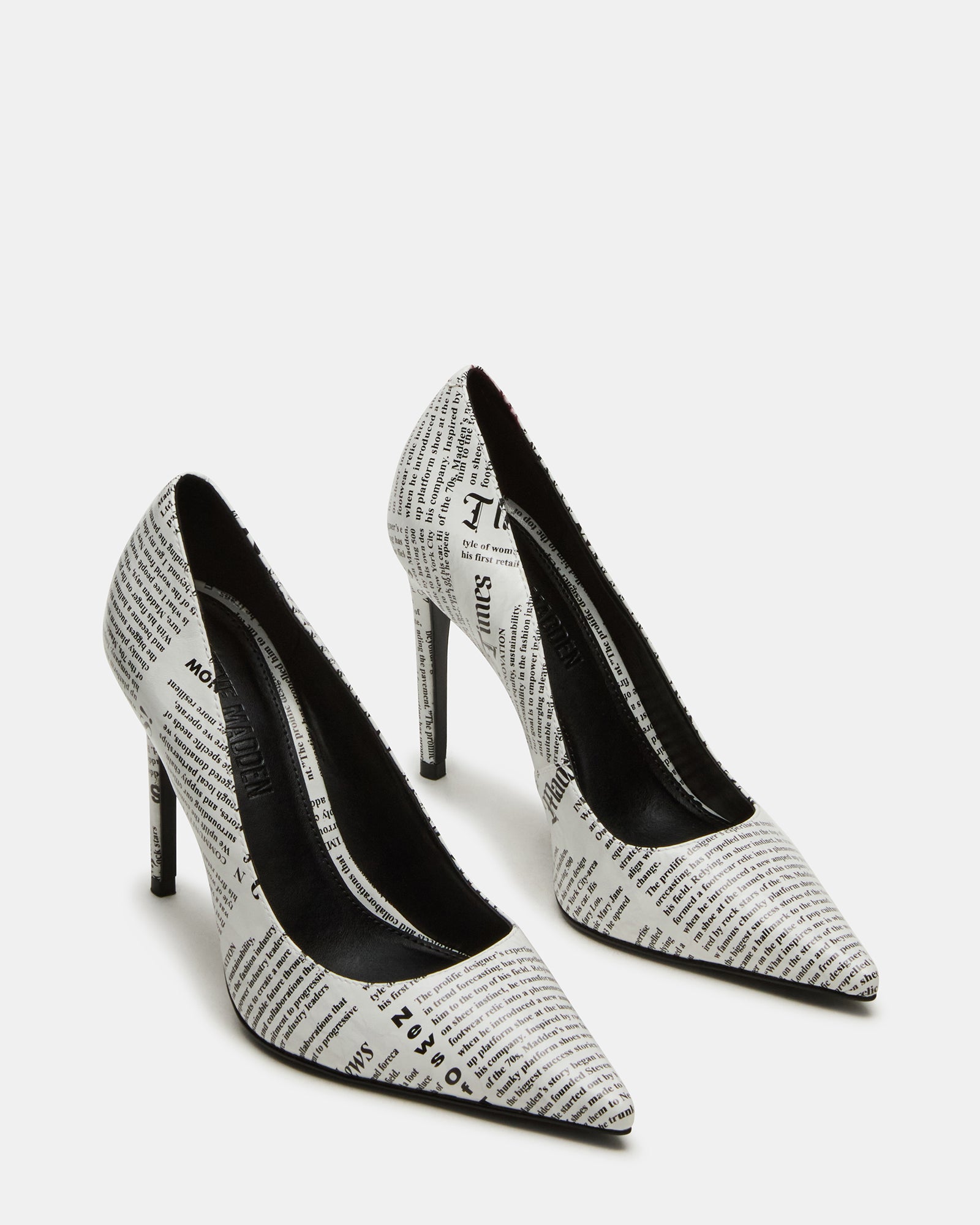 Close-up of silver high heels in pink with elegant pointed toe design