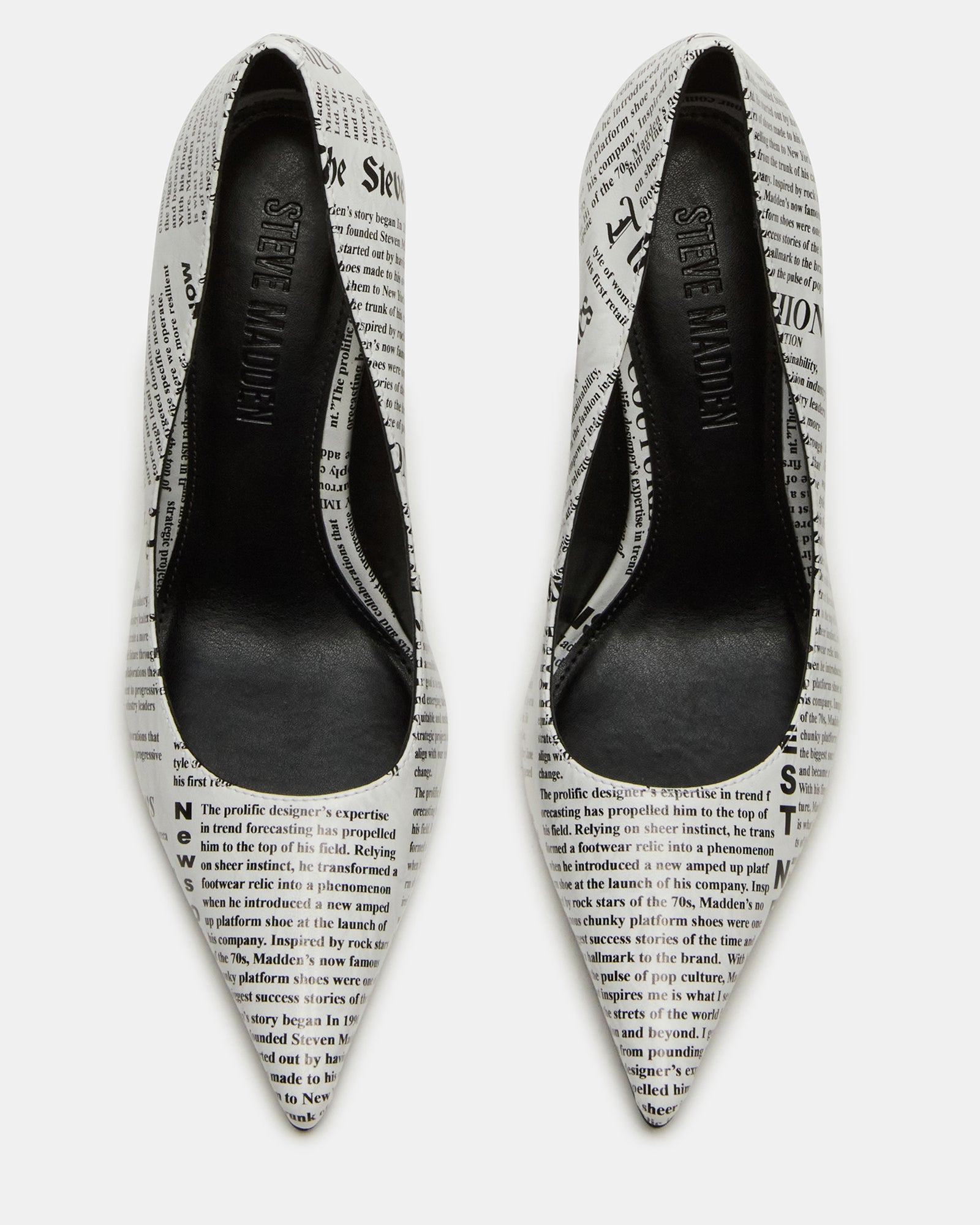 Side view of NOIR Newspaper high heels with pointed toe and stiletto heel in black