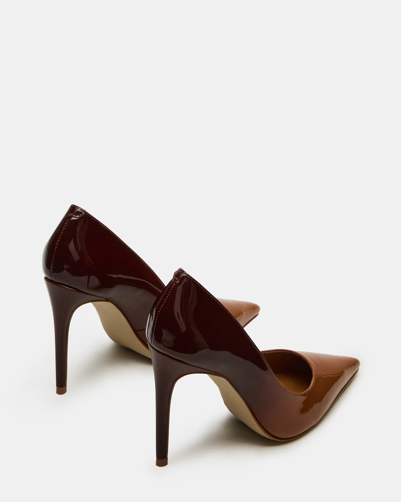 Side view of light pink high heel shoes styled with an evening dress