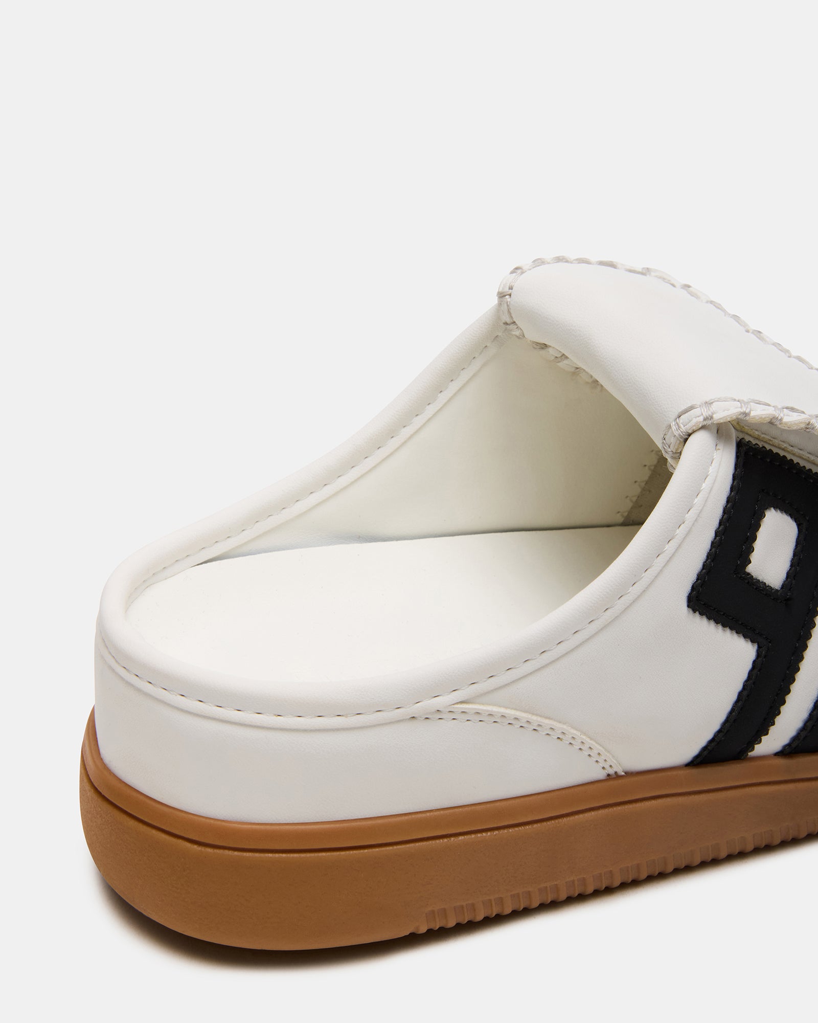 Mens slip on shoes with textile and vegan leather upper.