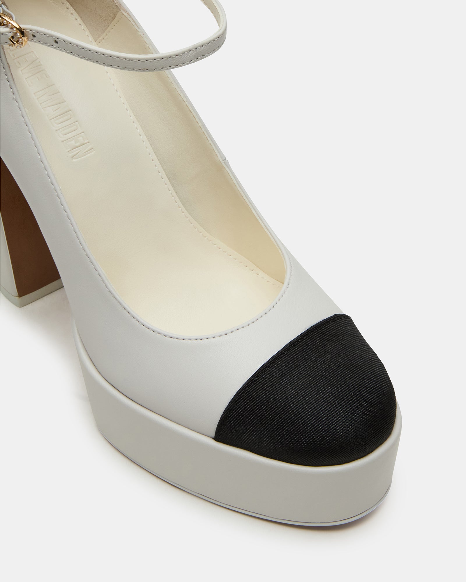 Back view of boots platform shoes showing ankle strap and secure fit