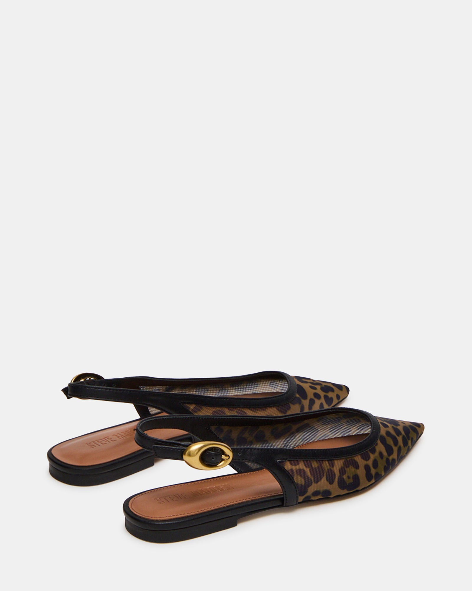 Side profile showing the slingback strap and low heel construction