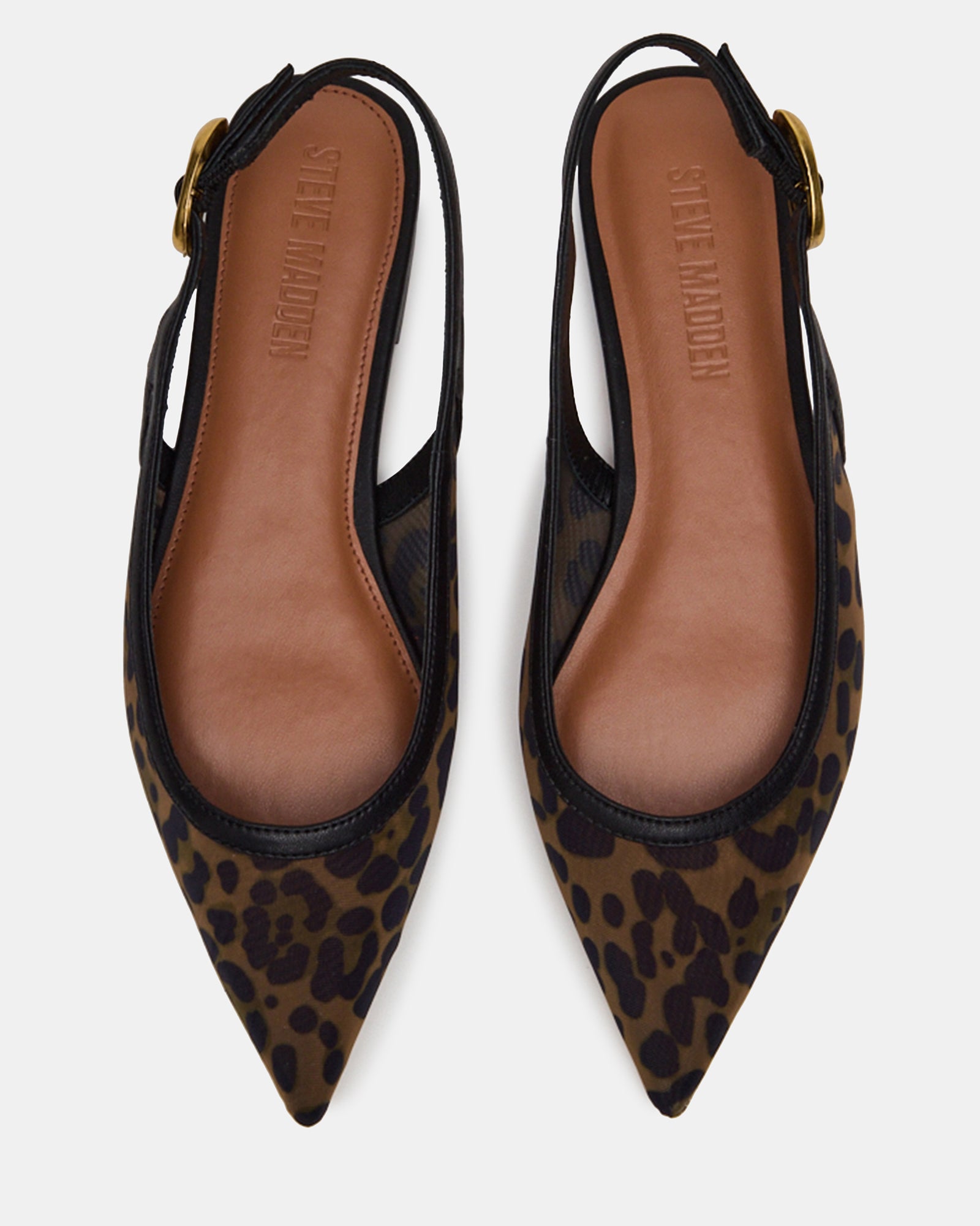 Black slingback flats styled with cropped trousers for a business casual look
