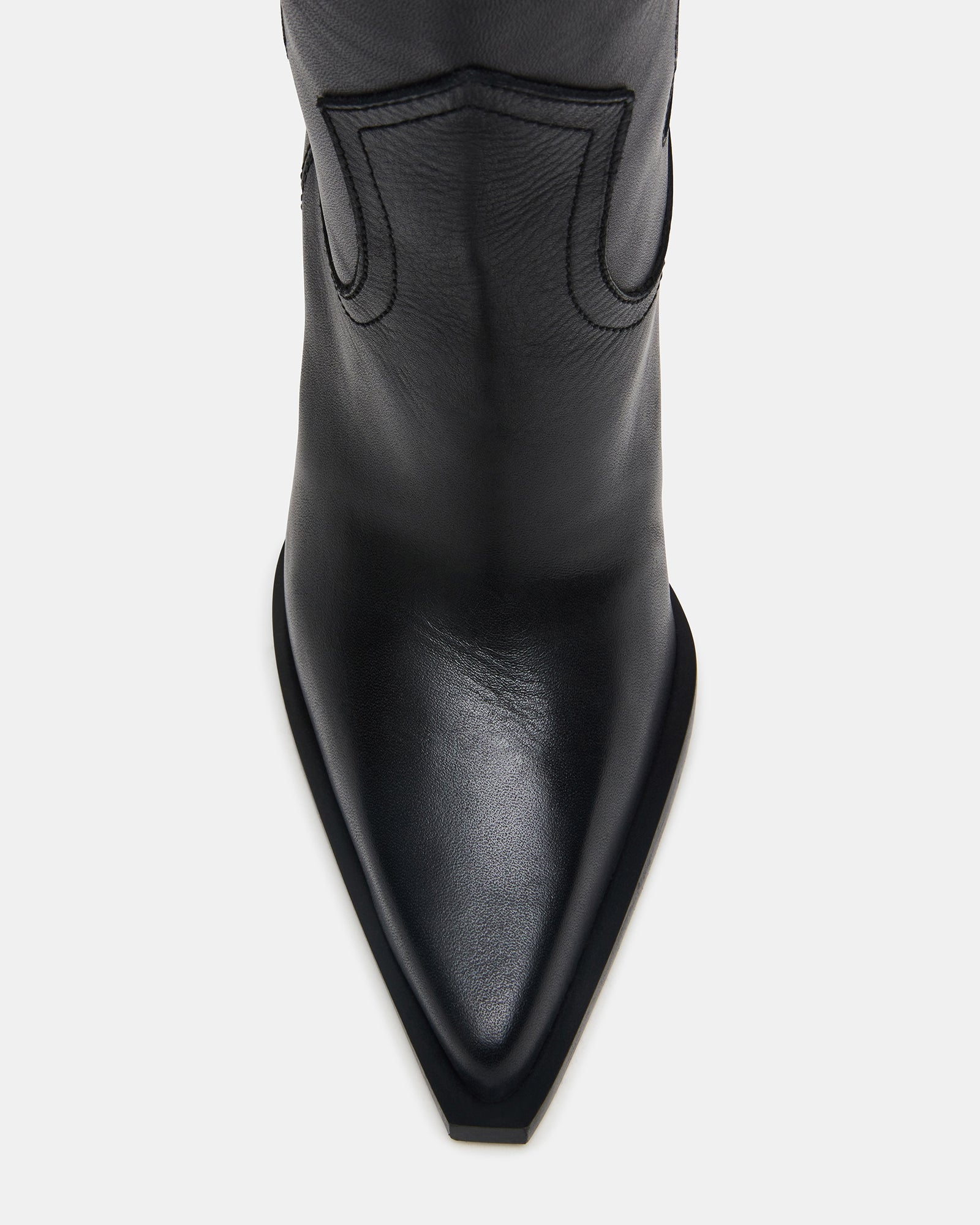 Outlaw western boots side profile with pointed toe detail