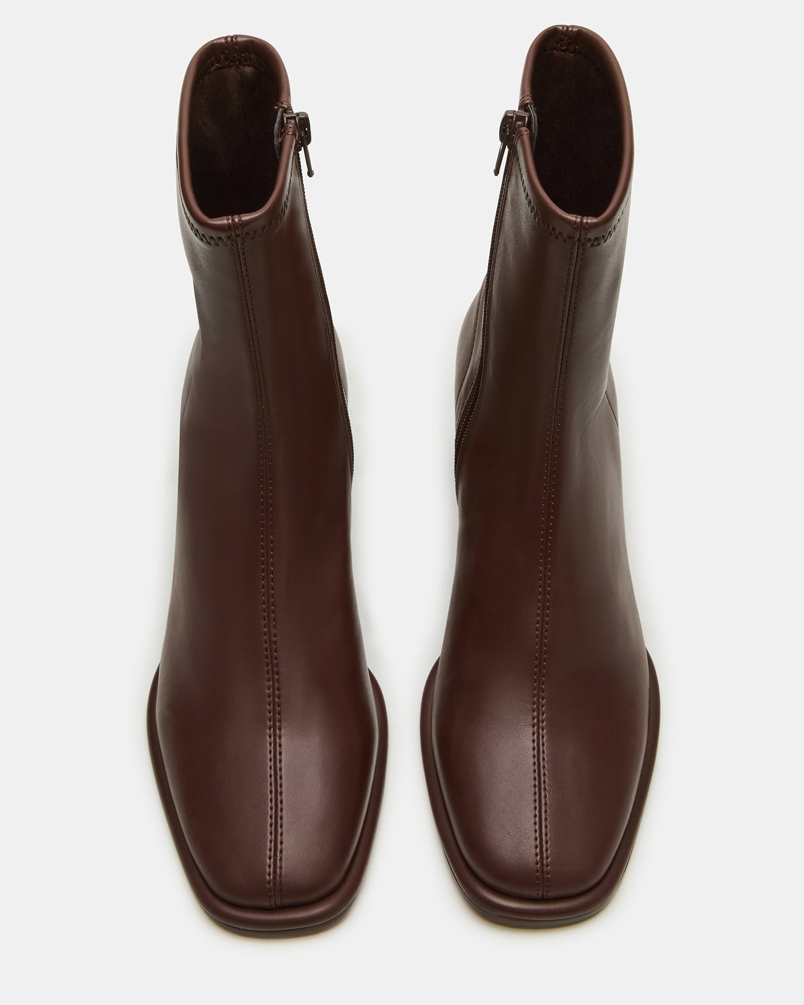Pammy brown ankle boots side view, showcasing the block heel and square toe design