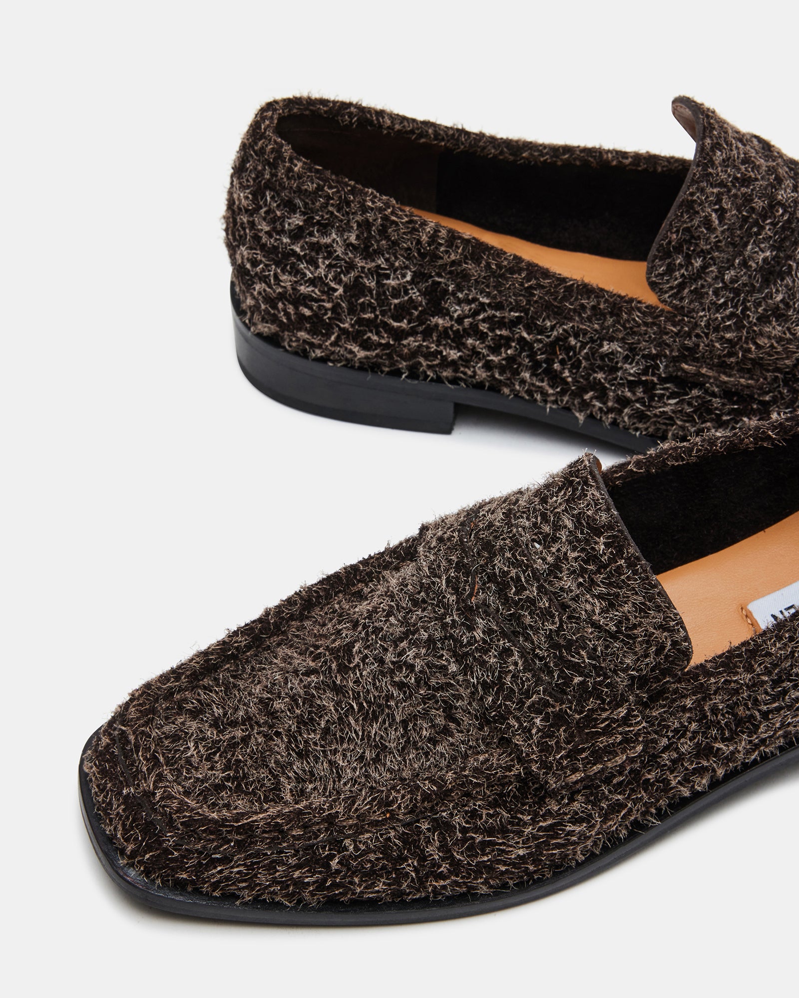 Stylish brown suede shoes ideal for everyday wear.