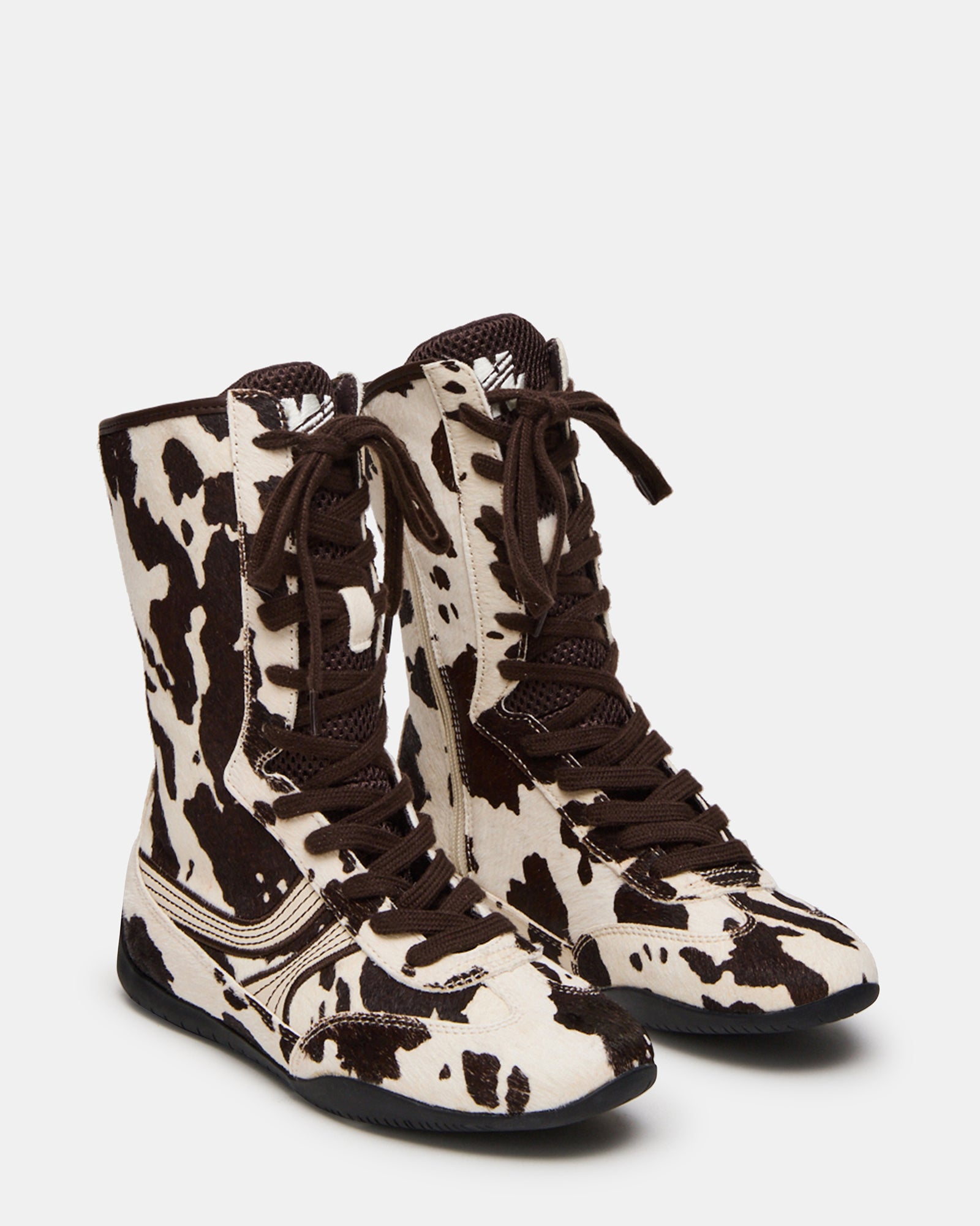 Close-up of the lace-up system on PAXTIN high-top sneakers.