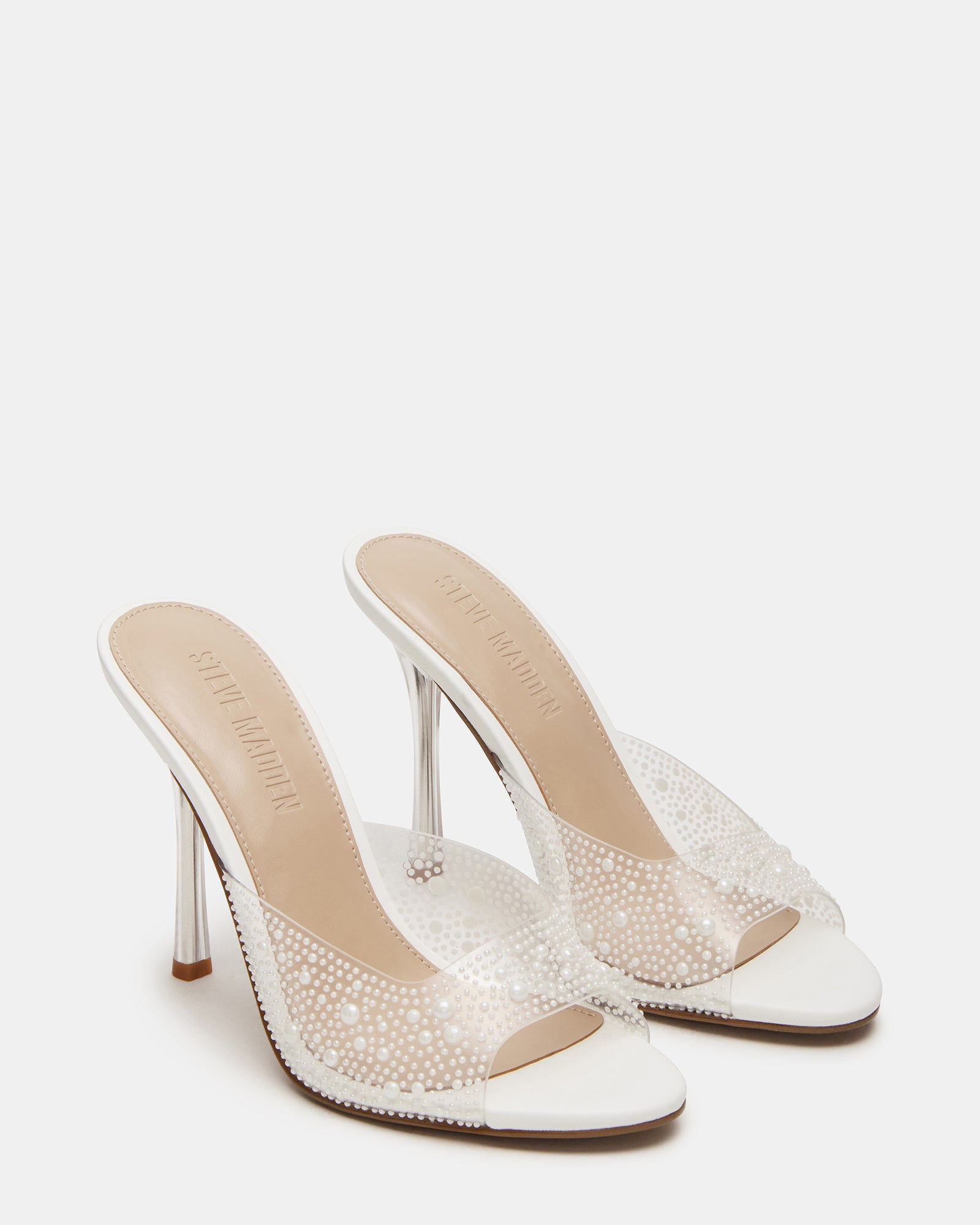 Front view of Peach Pearl Clear shoes with a sleek mule design for evening wear