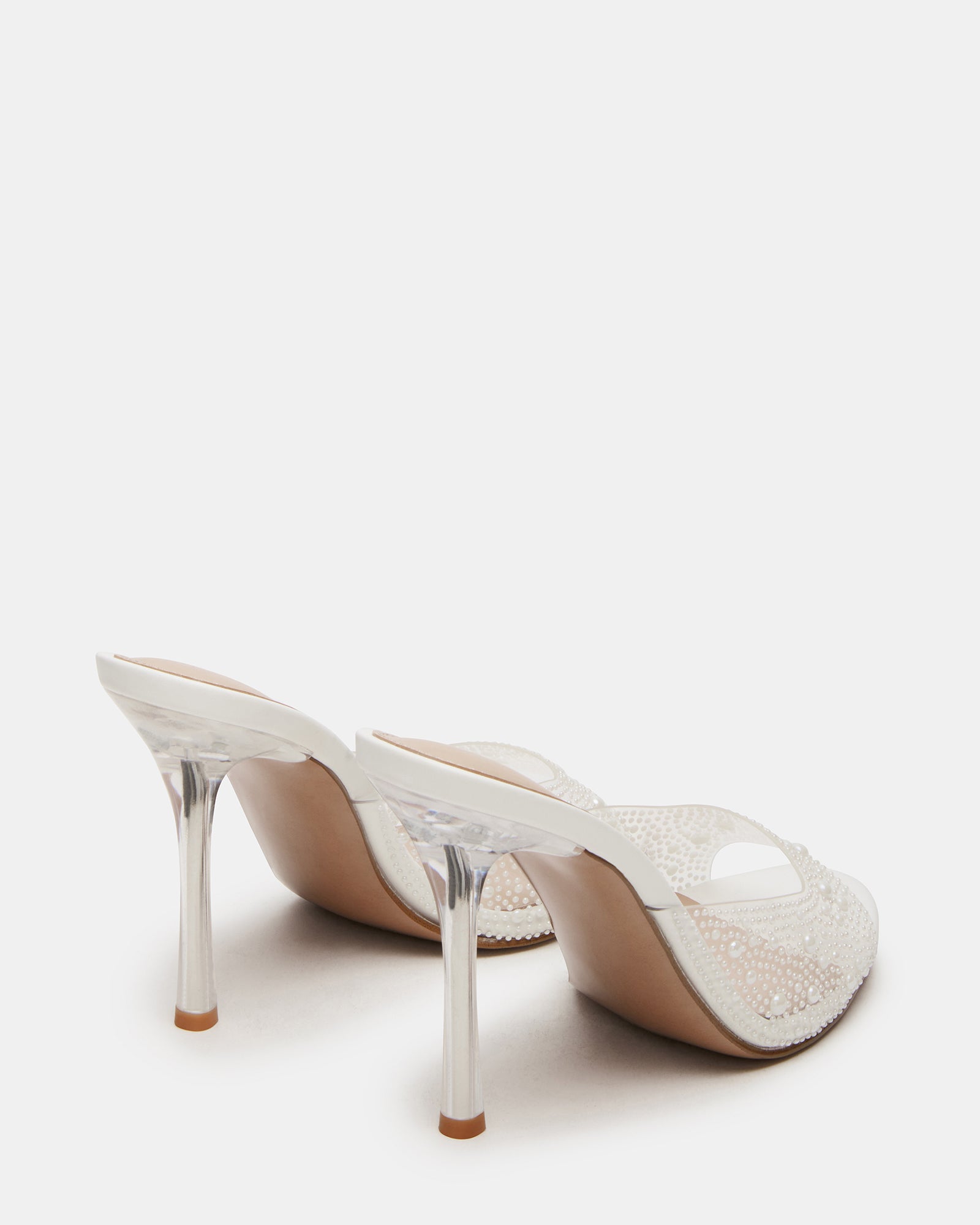 Front view of Peach Pearl Clear shoes with a sleek mule design for evening wear