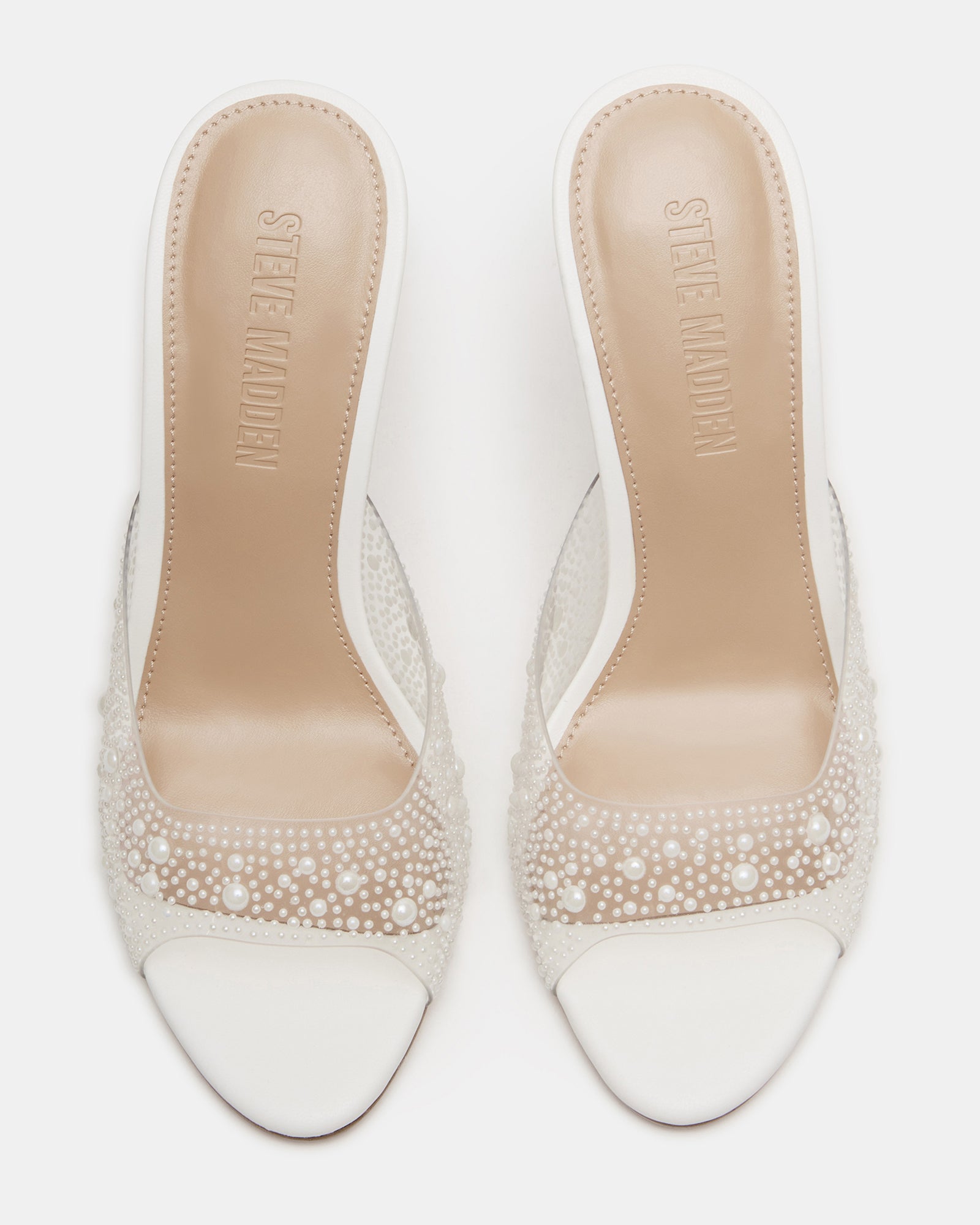 Side view of Peach Pearl Clear stiletto heels highlighting the transparent PVC material