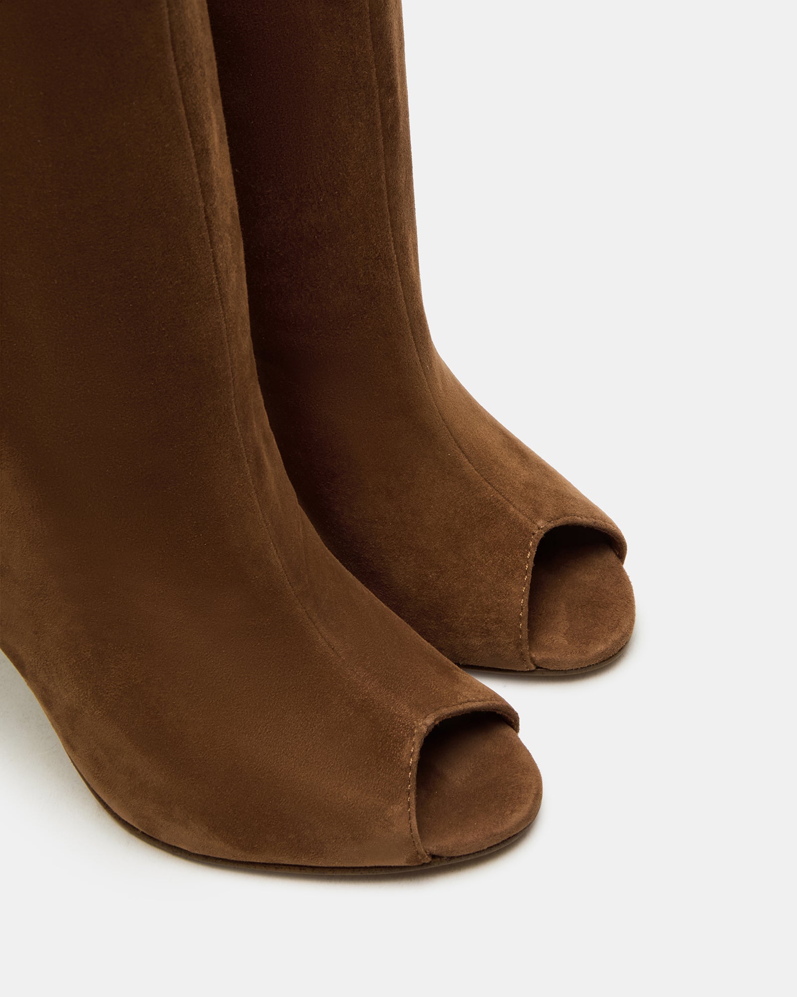 Peggie chestnut suede boots styled with a fashionable outfit.