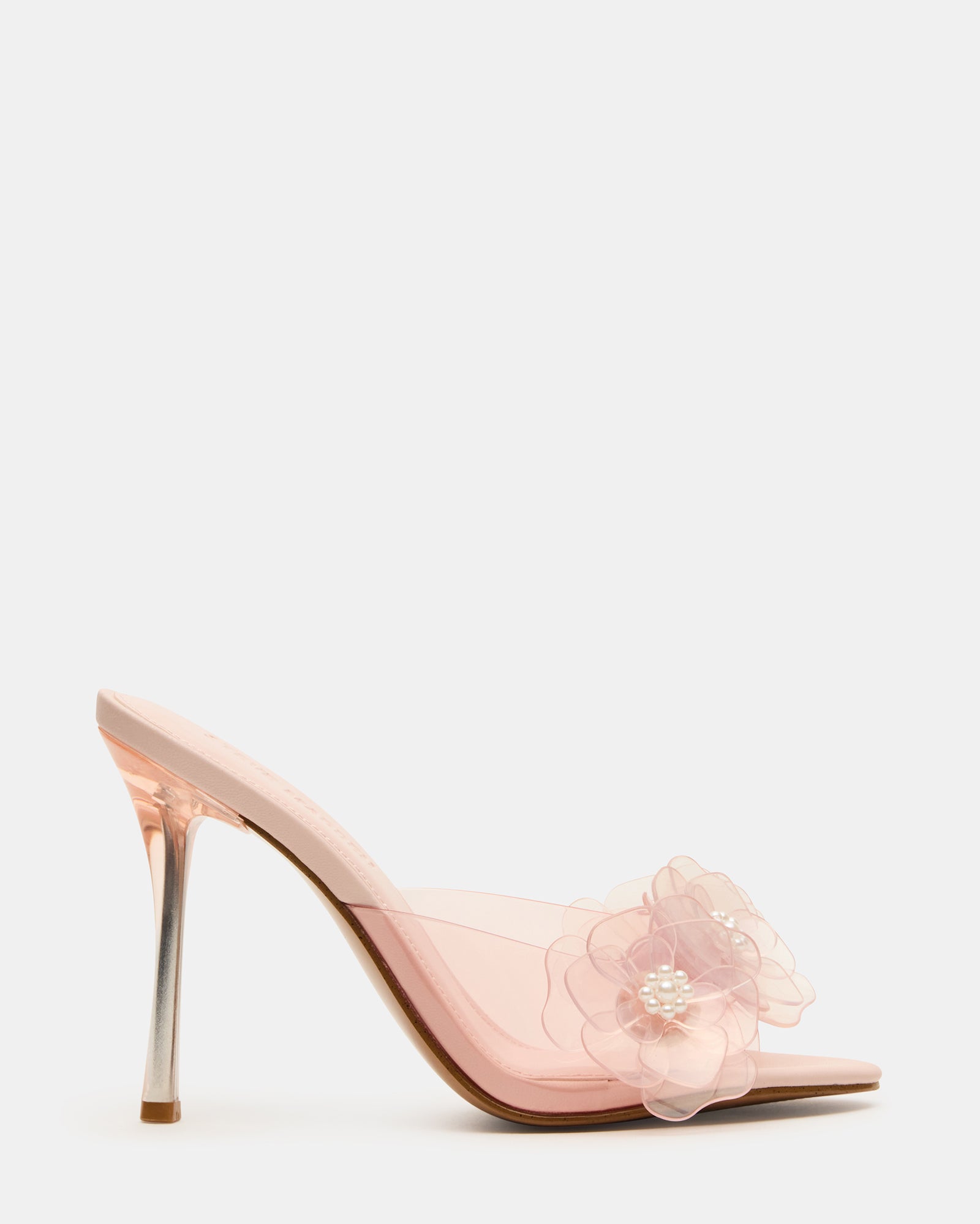 Side view of light pink stiletto mule heels showcasing floral design.